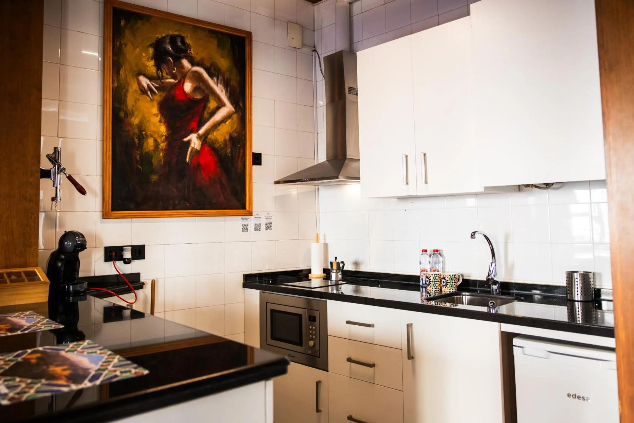 Kitchen or kitchenette in Apartamentos Reyes Católicos