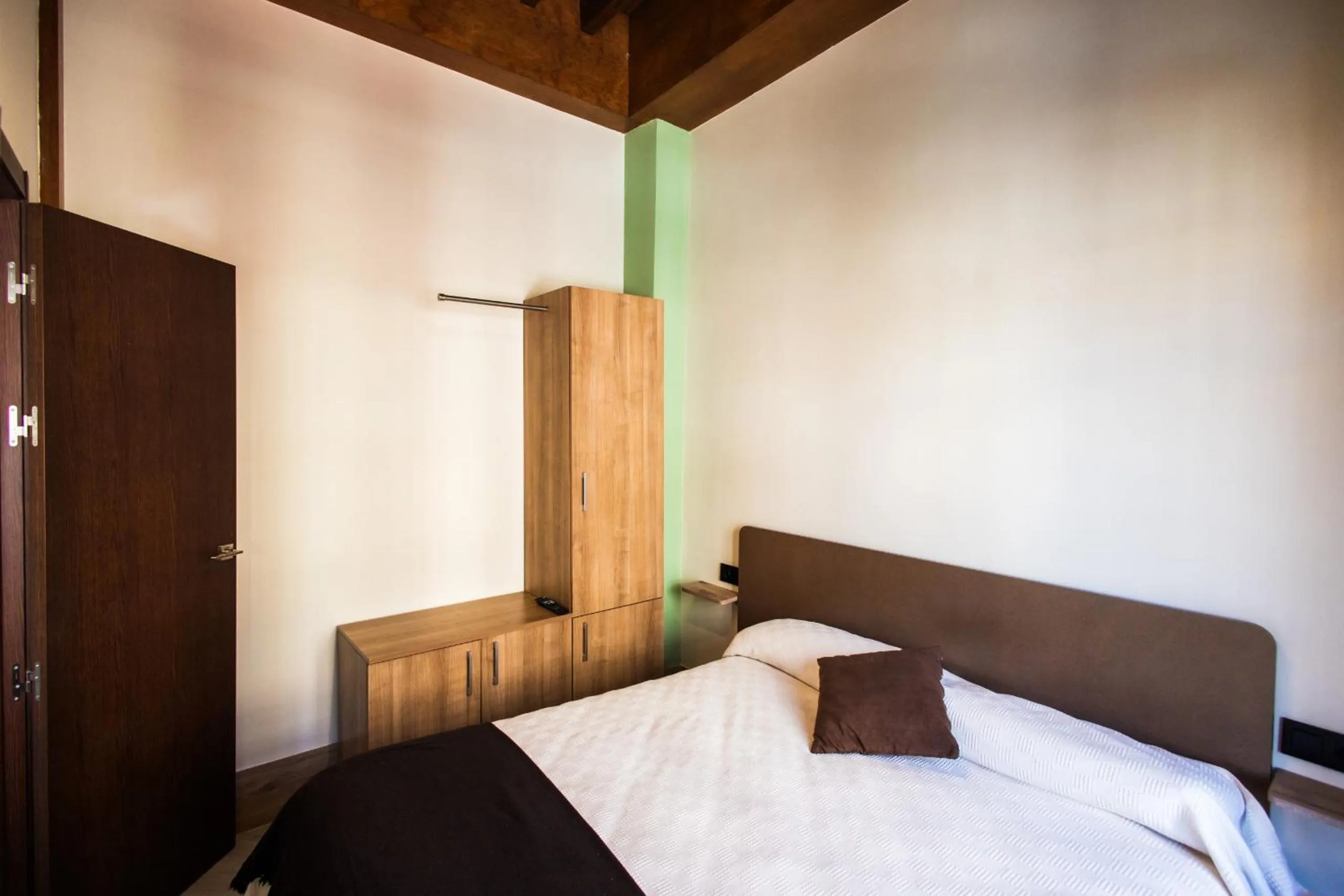 Bed in Apartamentos Reyes Católicos