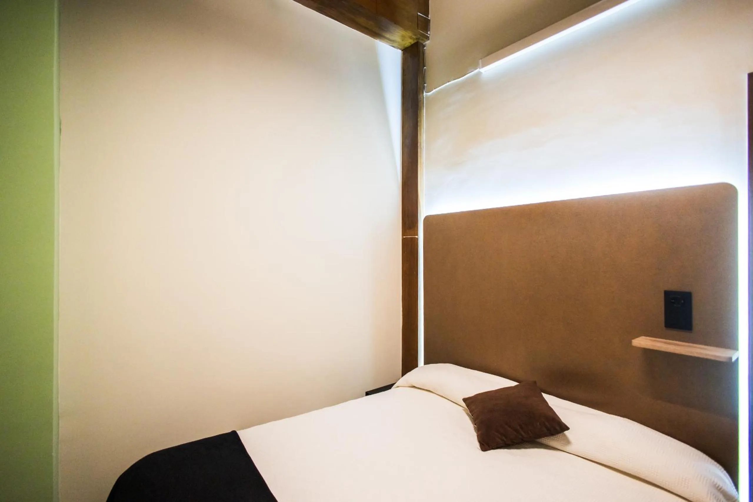 Bed in Apartamentos Reyes Católicos