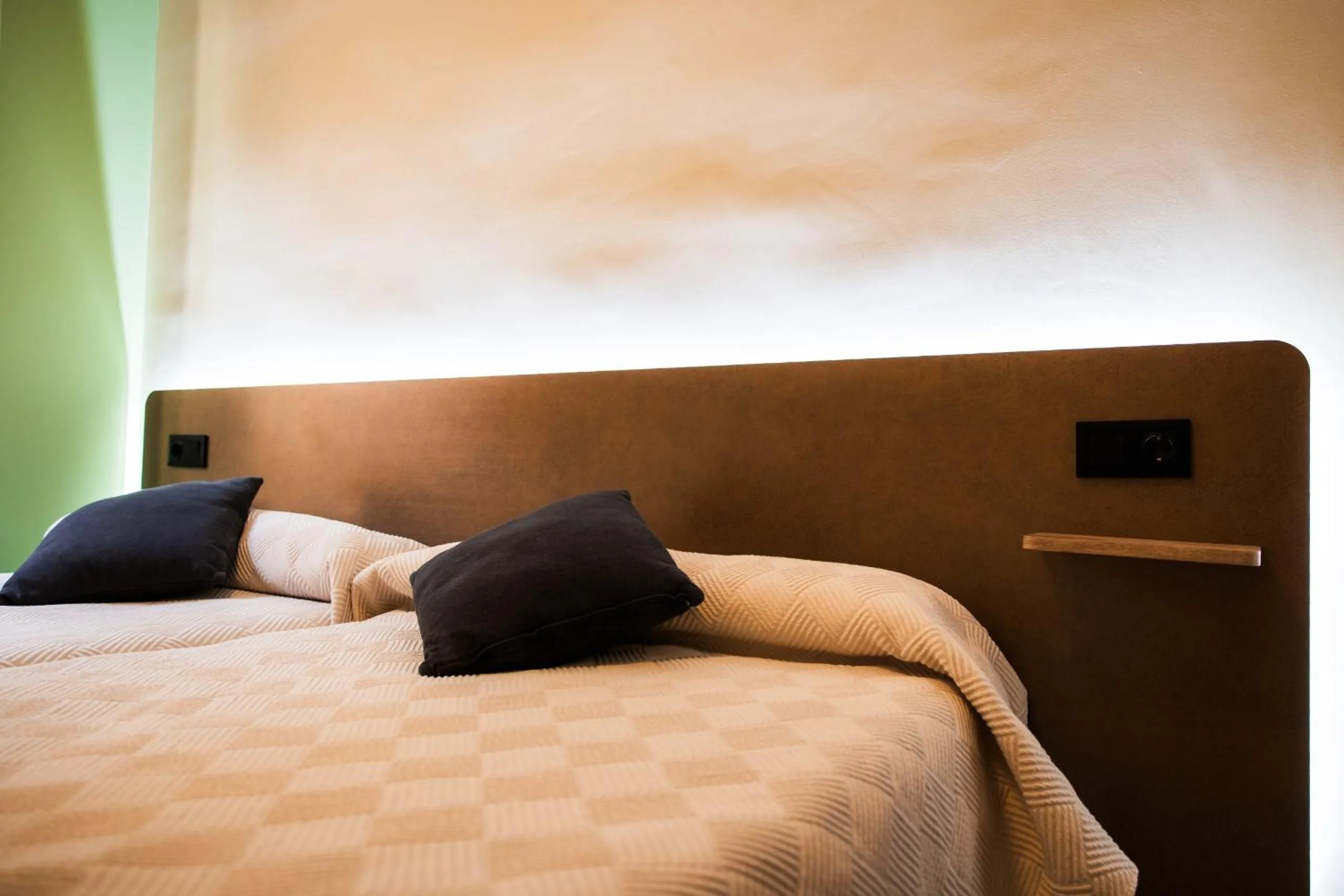 Bed in Apartamentos Reyes Católicos