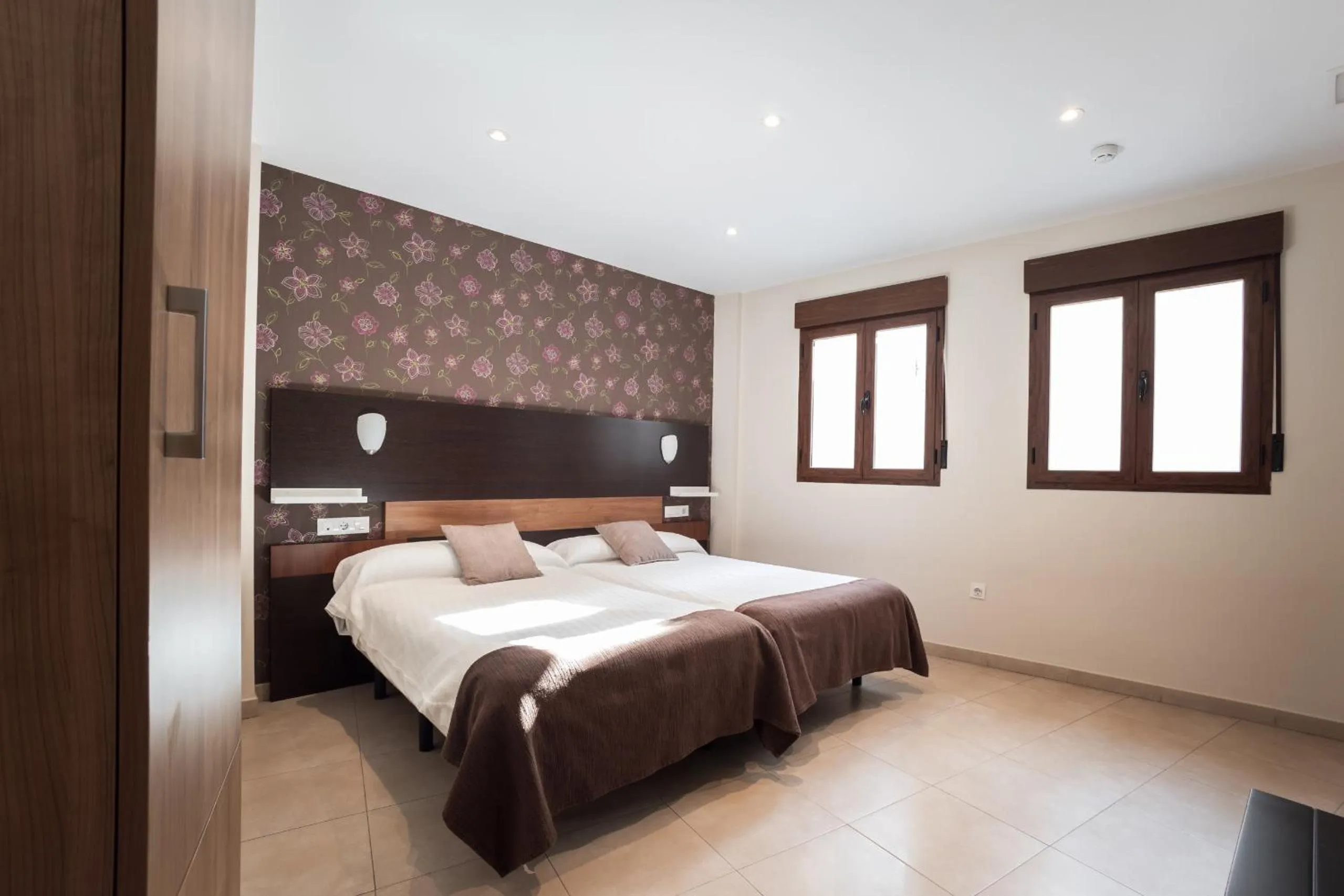 Bed in Apartamentos Reyes Católicos