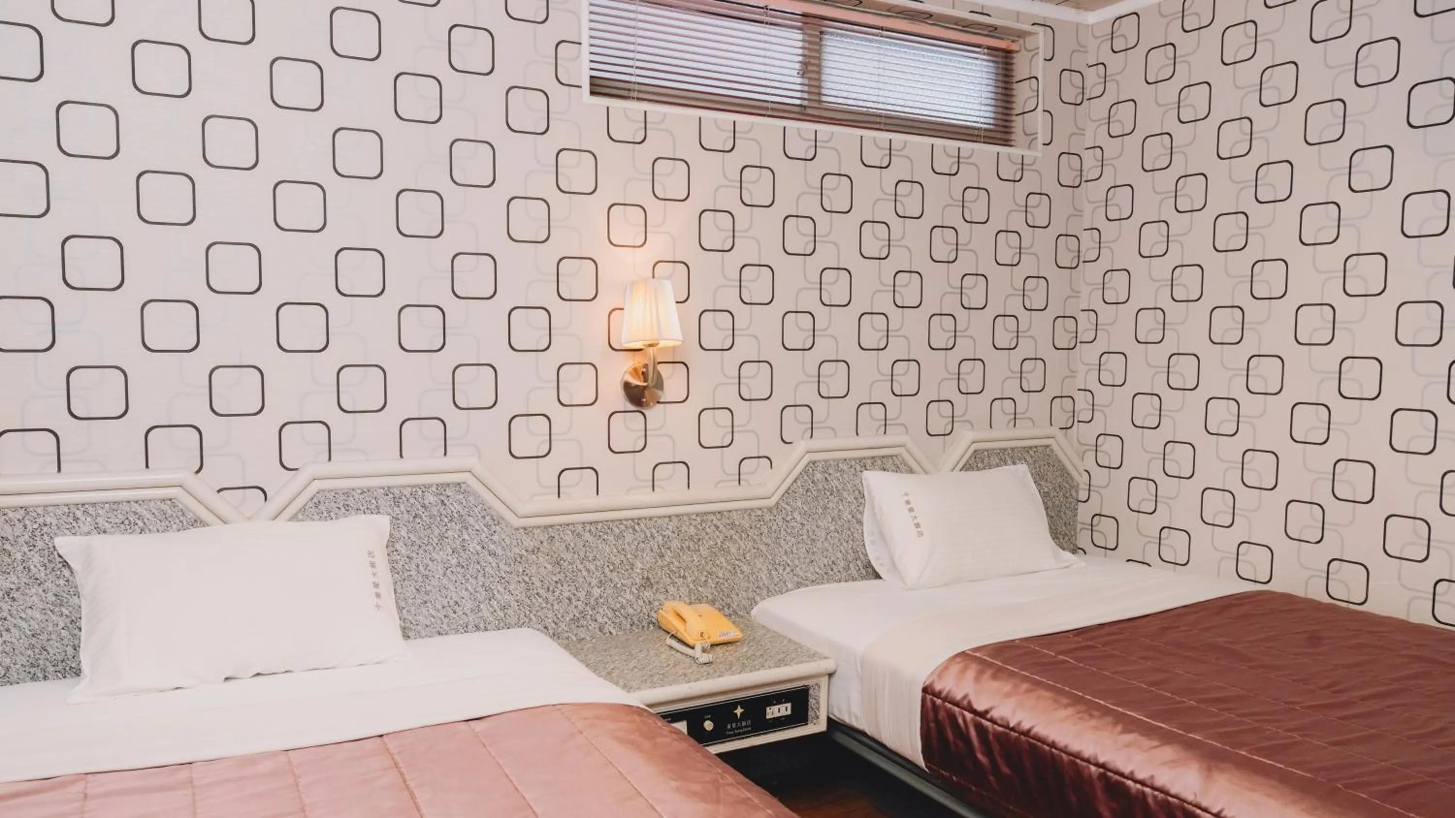 Bed in Tong Hsin Hotel