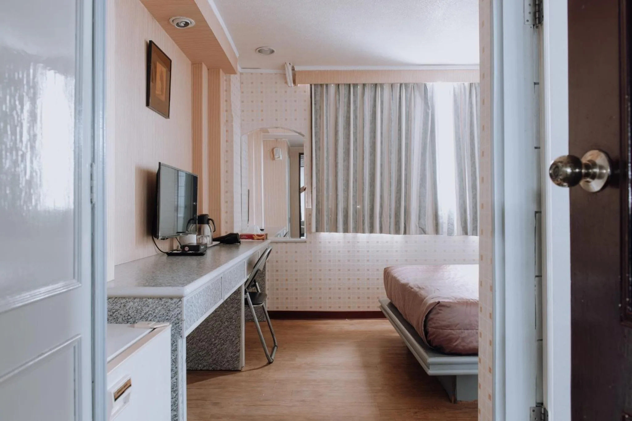 Bed in Tong Hsin Hotel