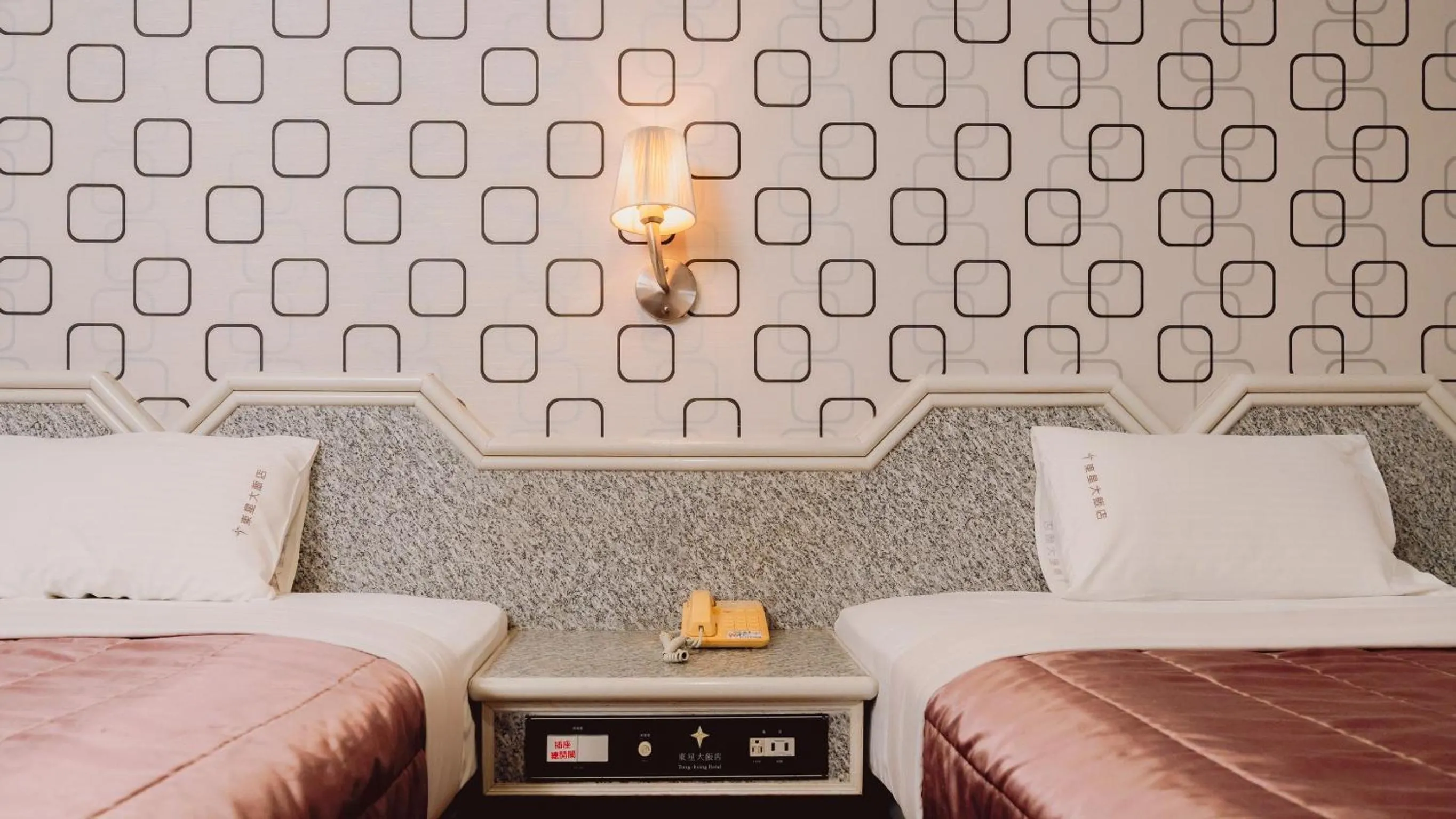 Bed in Tong Hsin Hotel