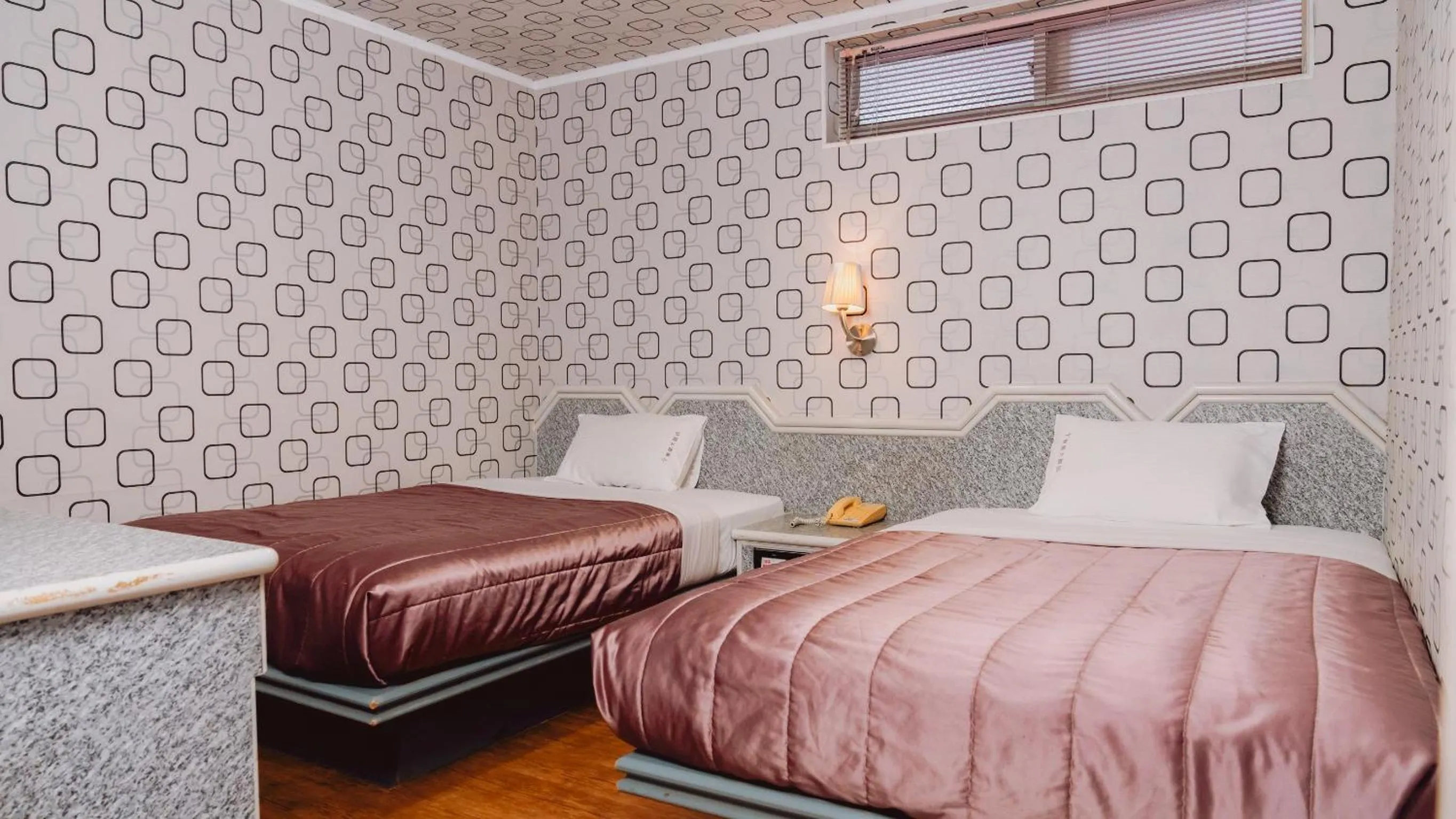 Bed in Tong Hsin Hotel