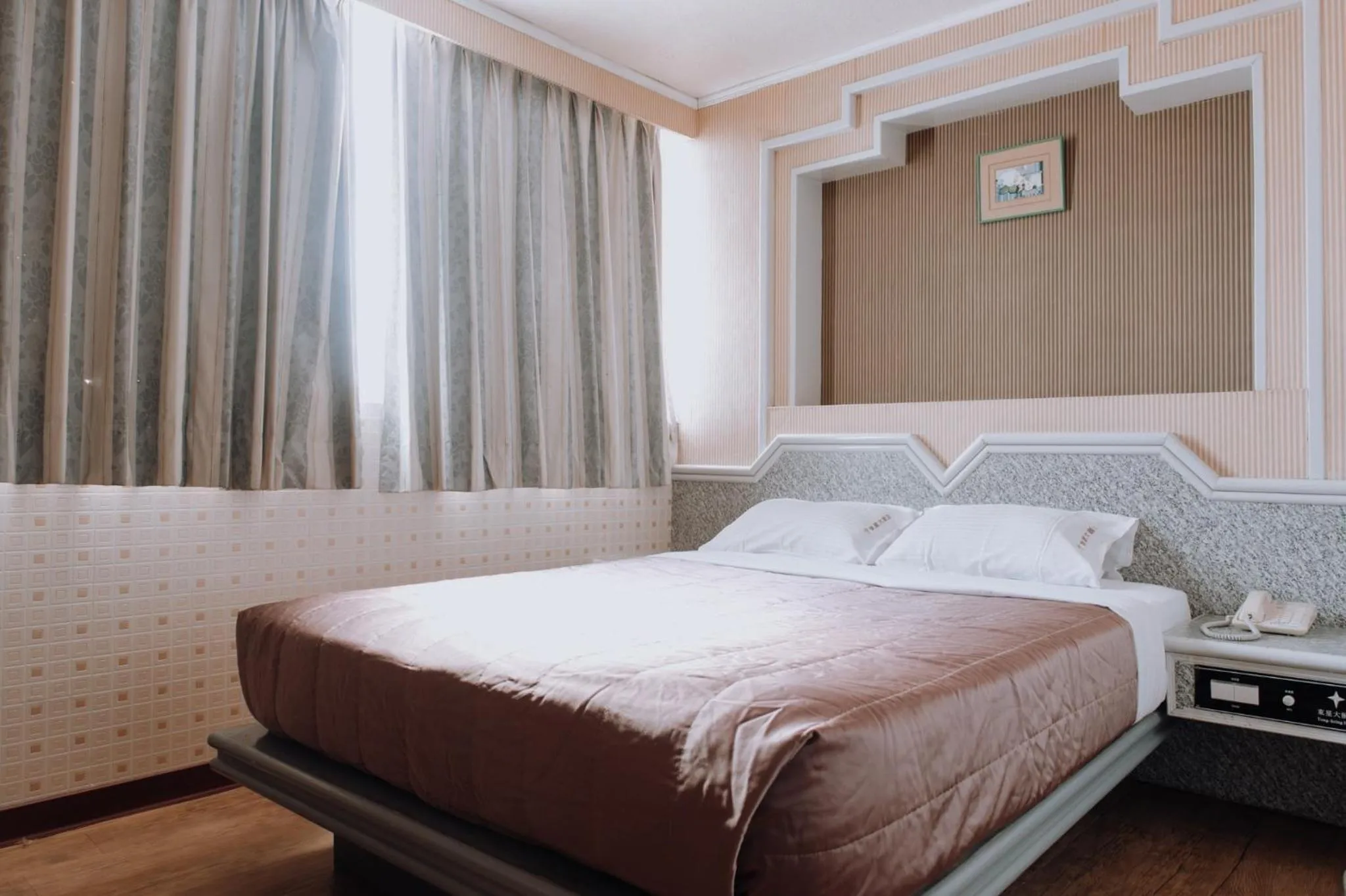 Bed in Tong Hsin Hotel