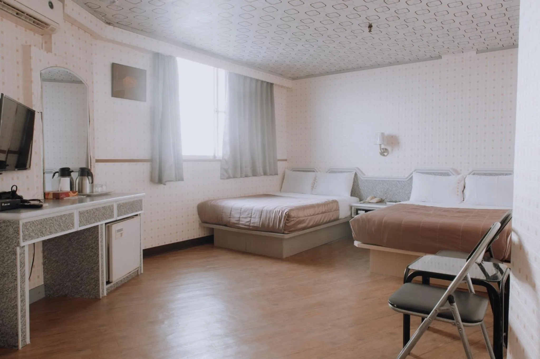 Bed in Tong Hsin Hotel