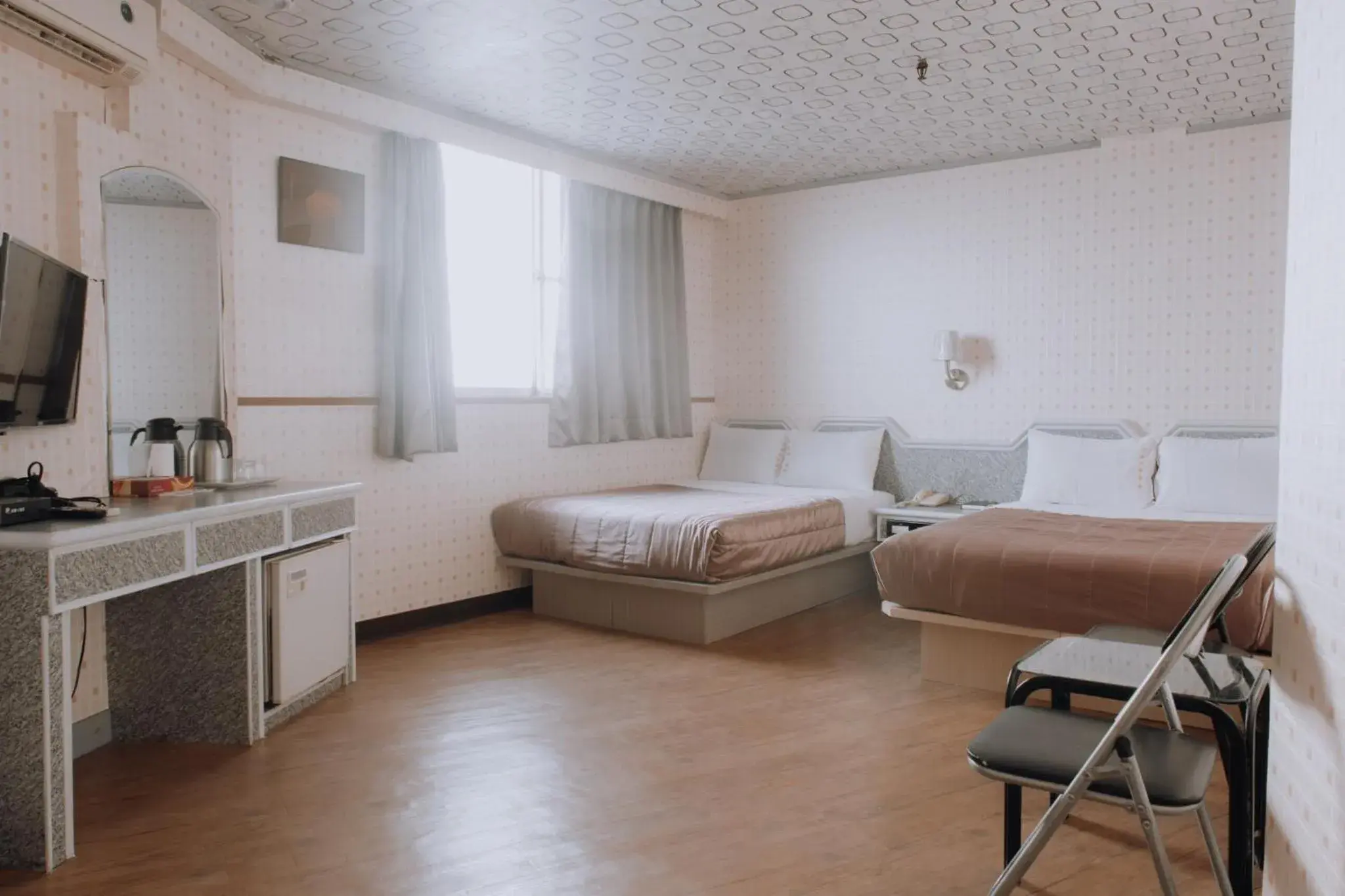 Quadruple Room in Tong Hsin Hotel Quadruple Room in Tong Hsin Hotel