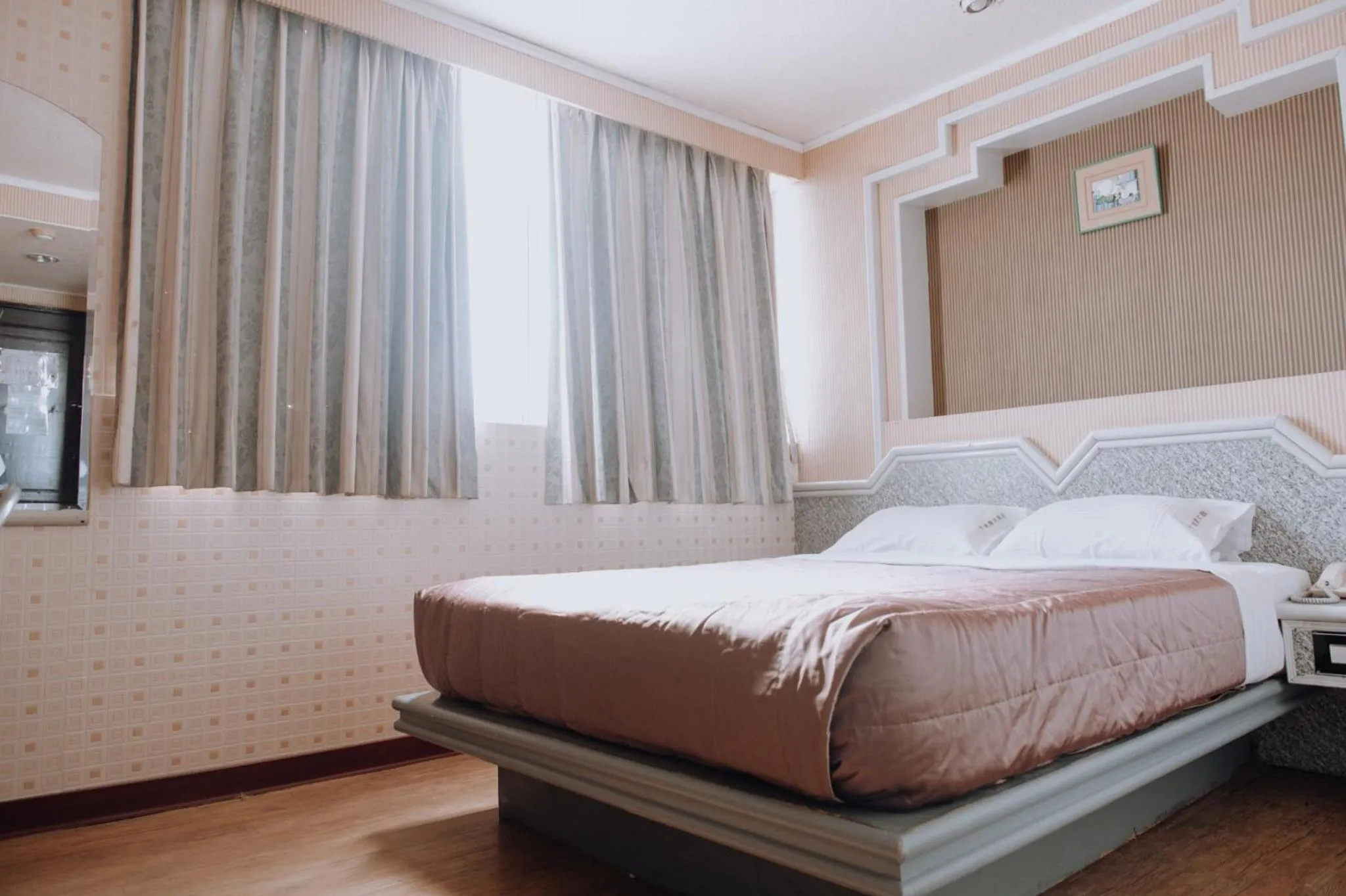 Bed in Tong Hsin Hotel