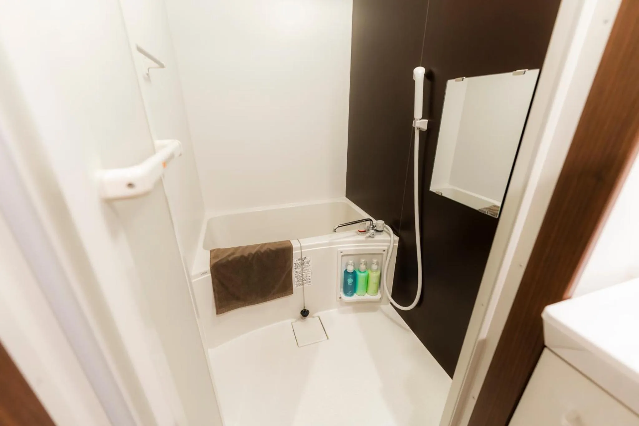 Shower in Apartment Hotel KANSO