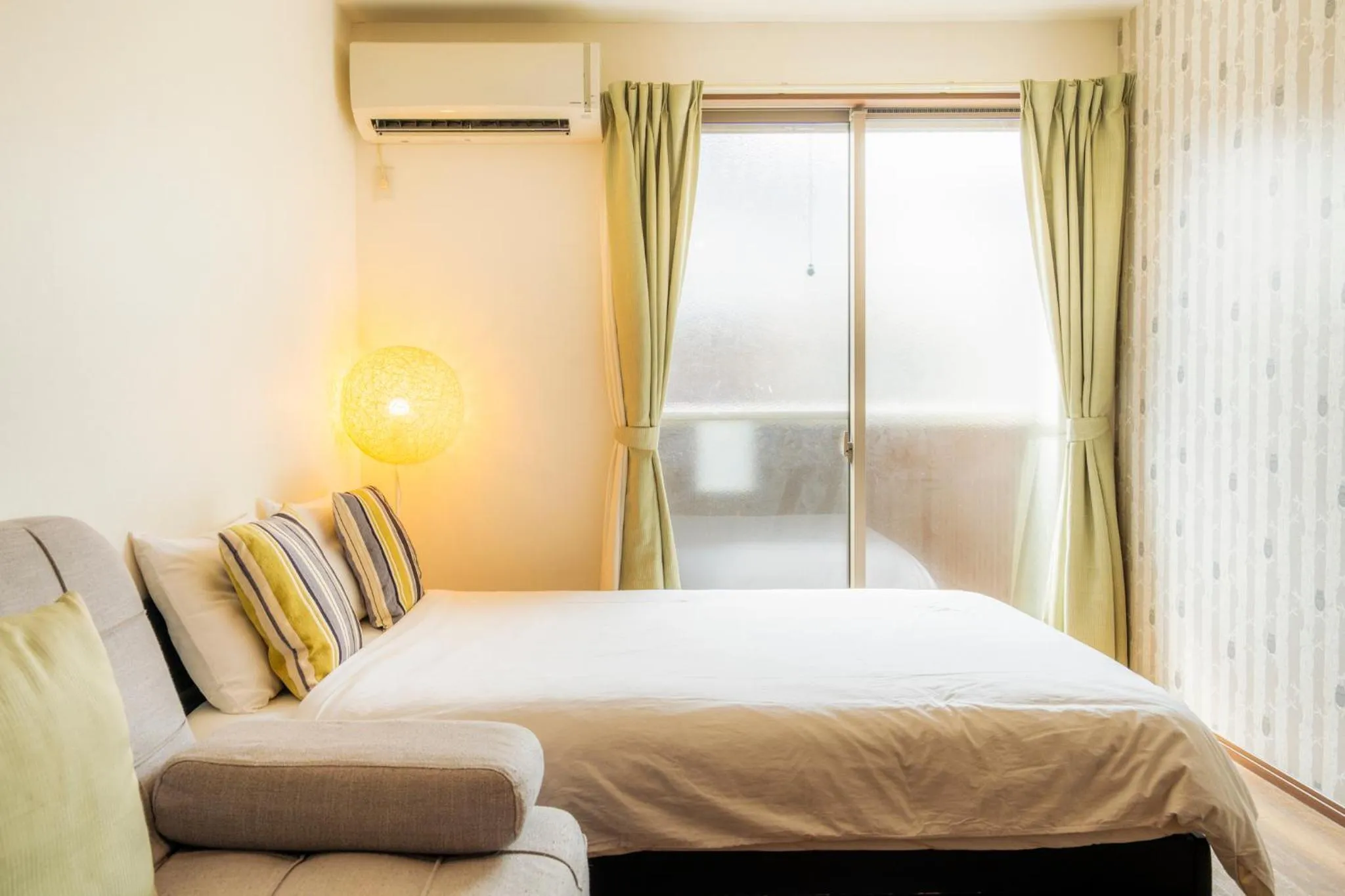 Bed in Apartment Hotel KANSO