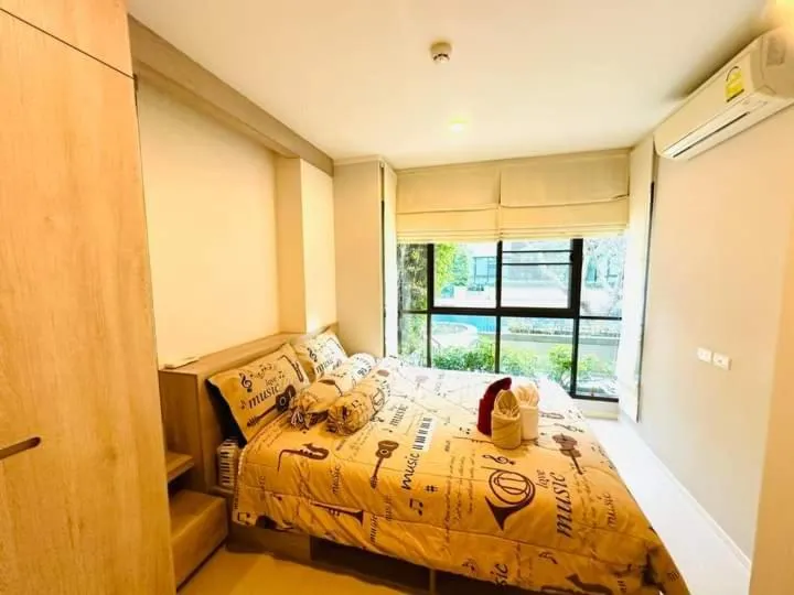 Bed in lumpini park beach