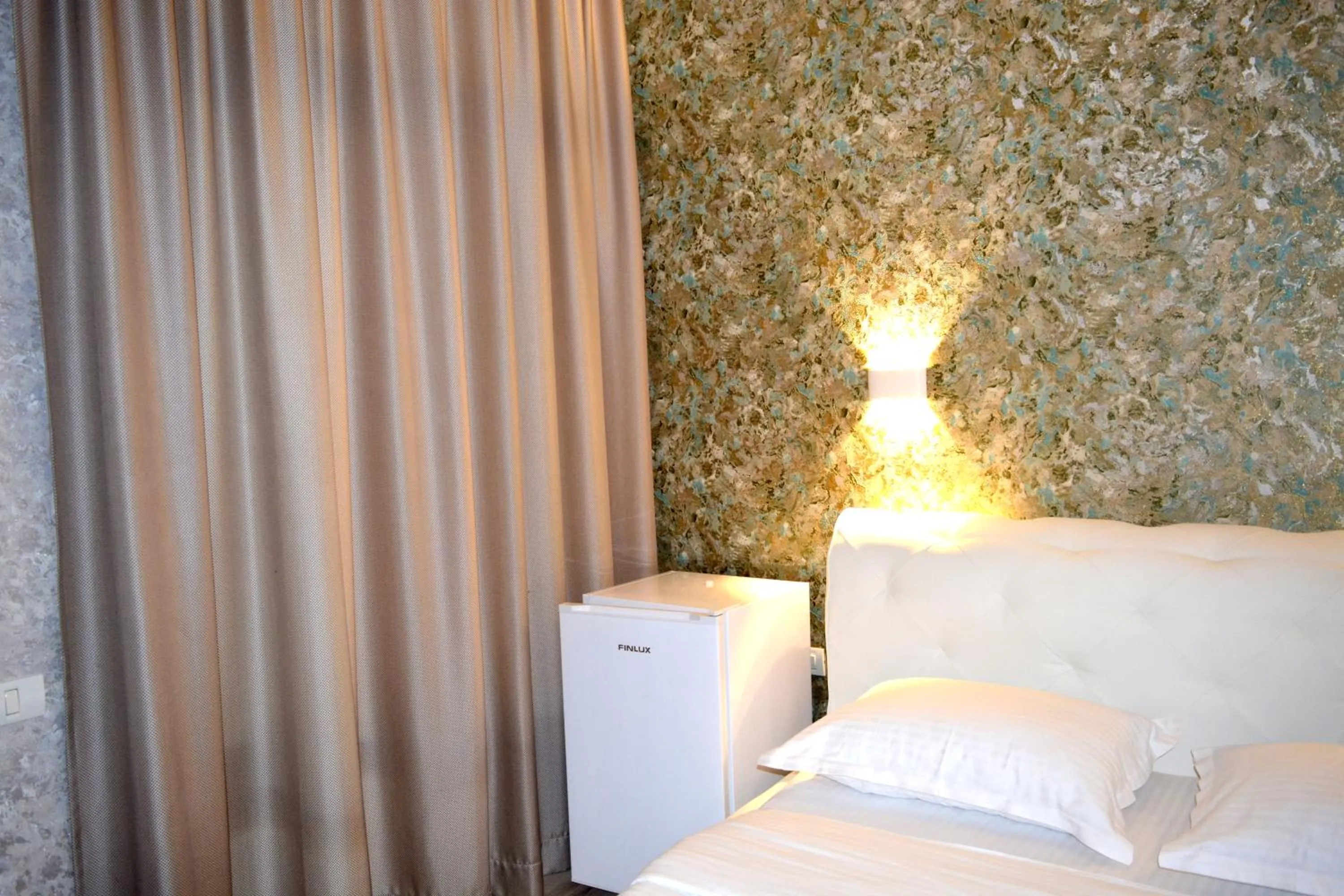 Bed in Arizet Boutique Mamaia