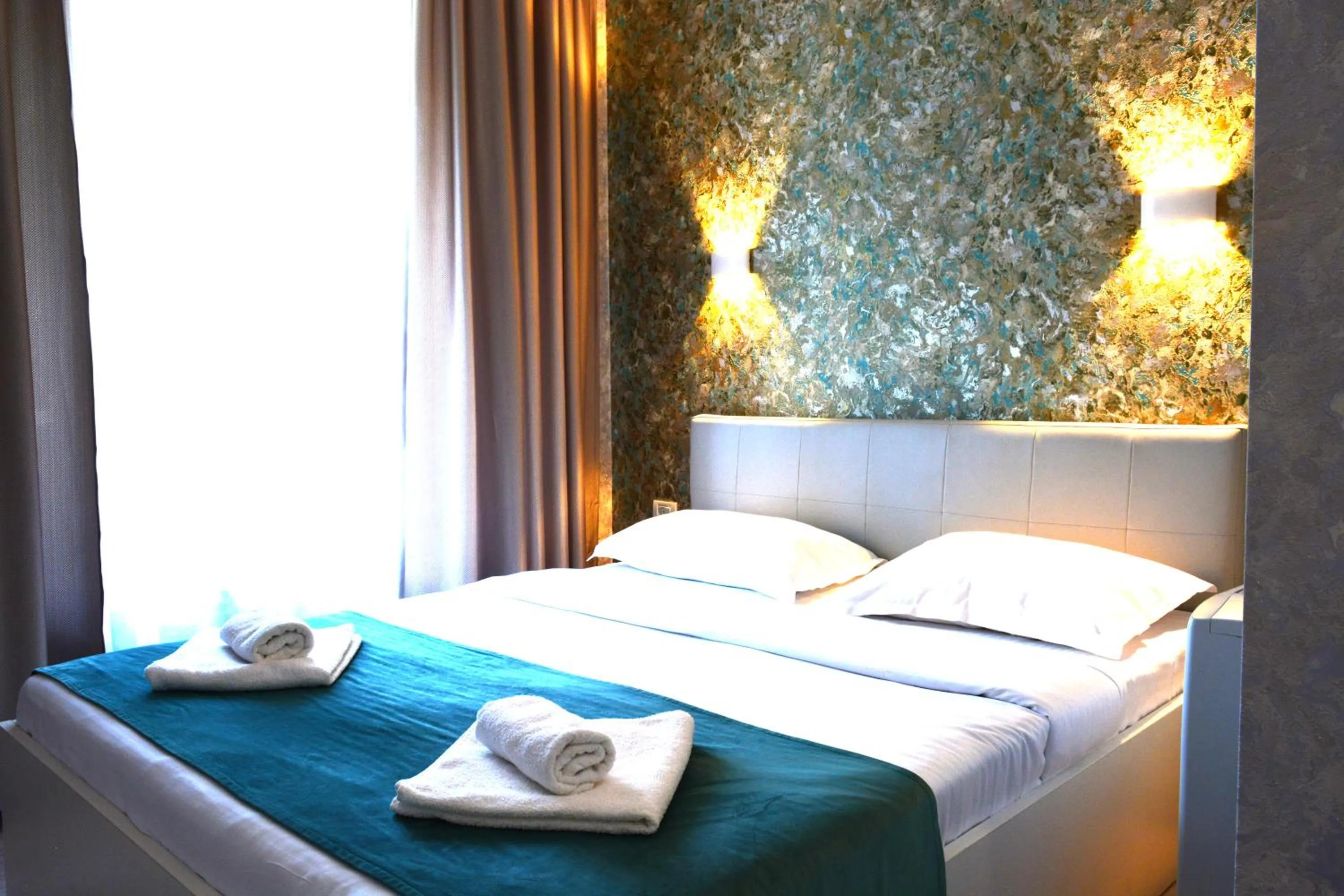 Bed in Arizet Boutique Mamaia