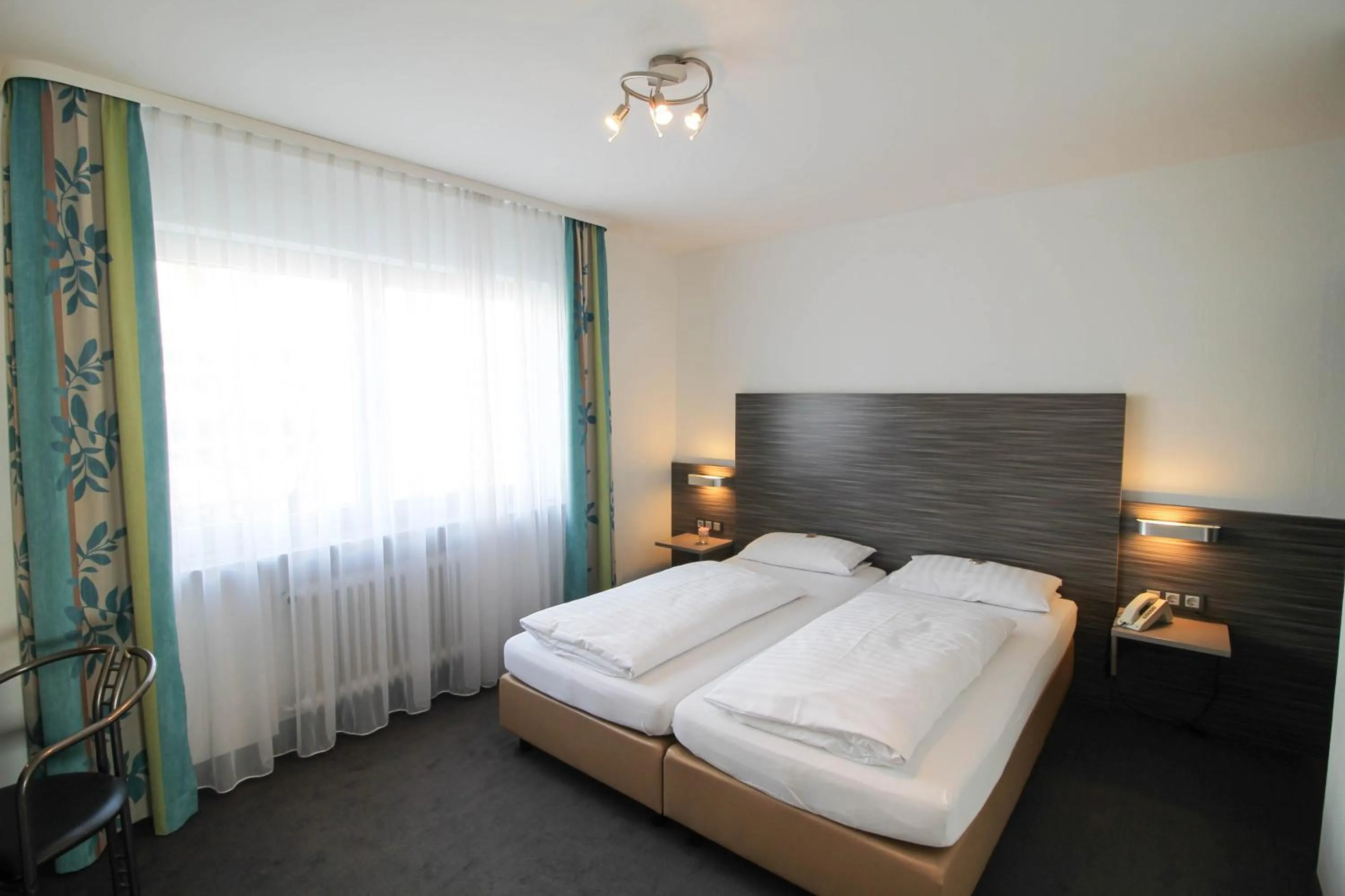 Photo of the whole room, Bed in Hotel am Zoo