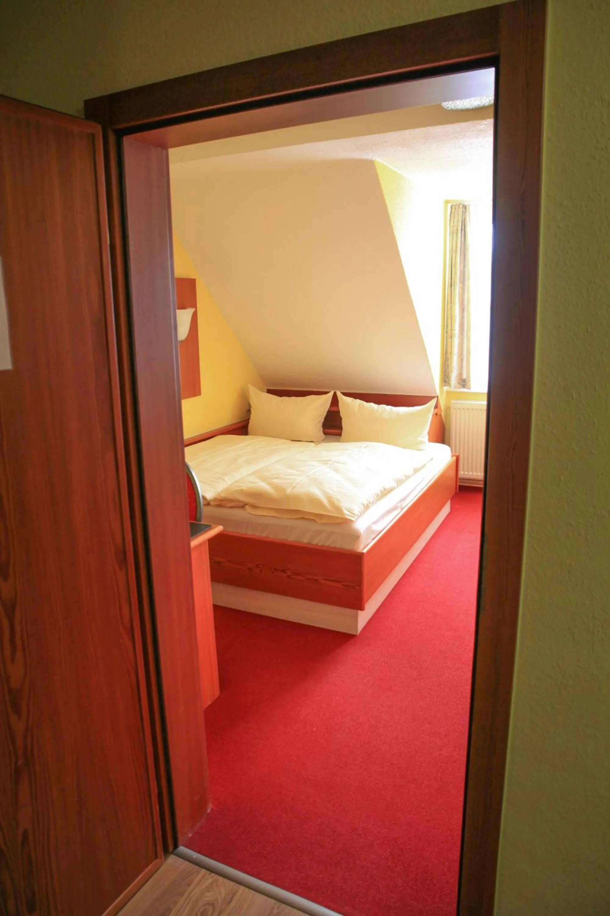 Bed in Hotel garni Harzer Hof