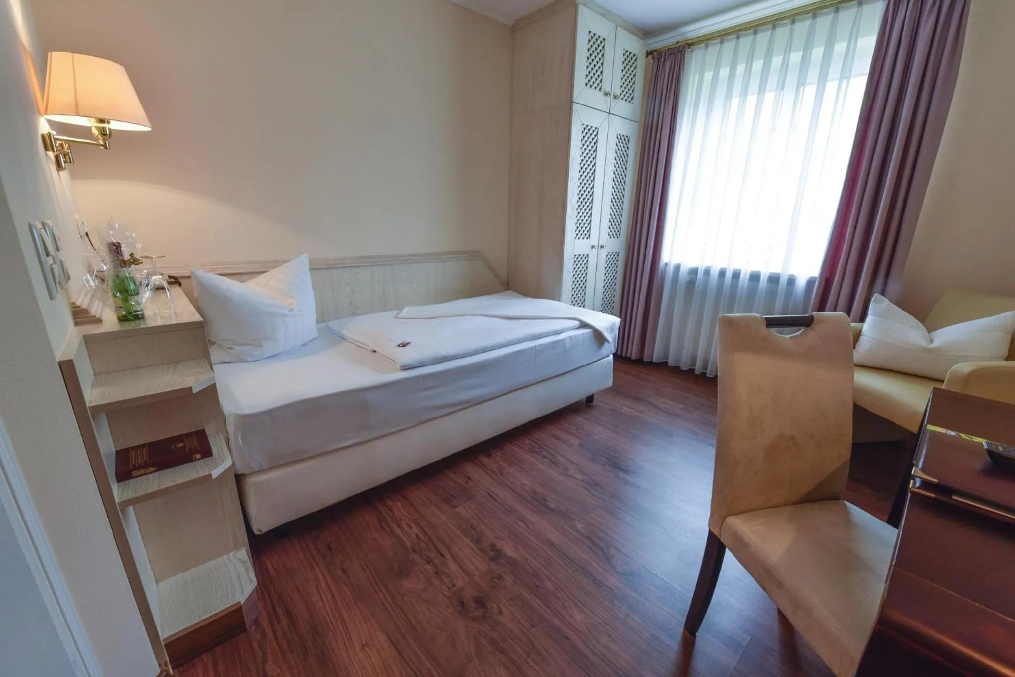 Photo of the whole room, Bed in Atrium Hotel Amadeus