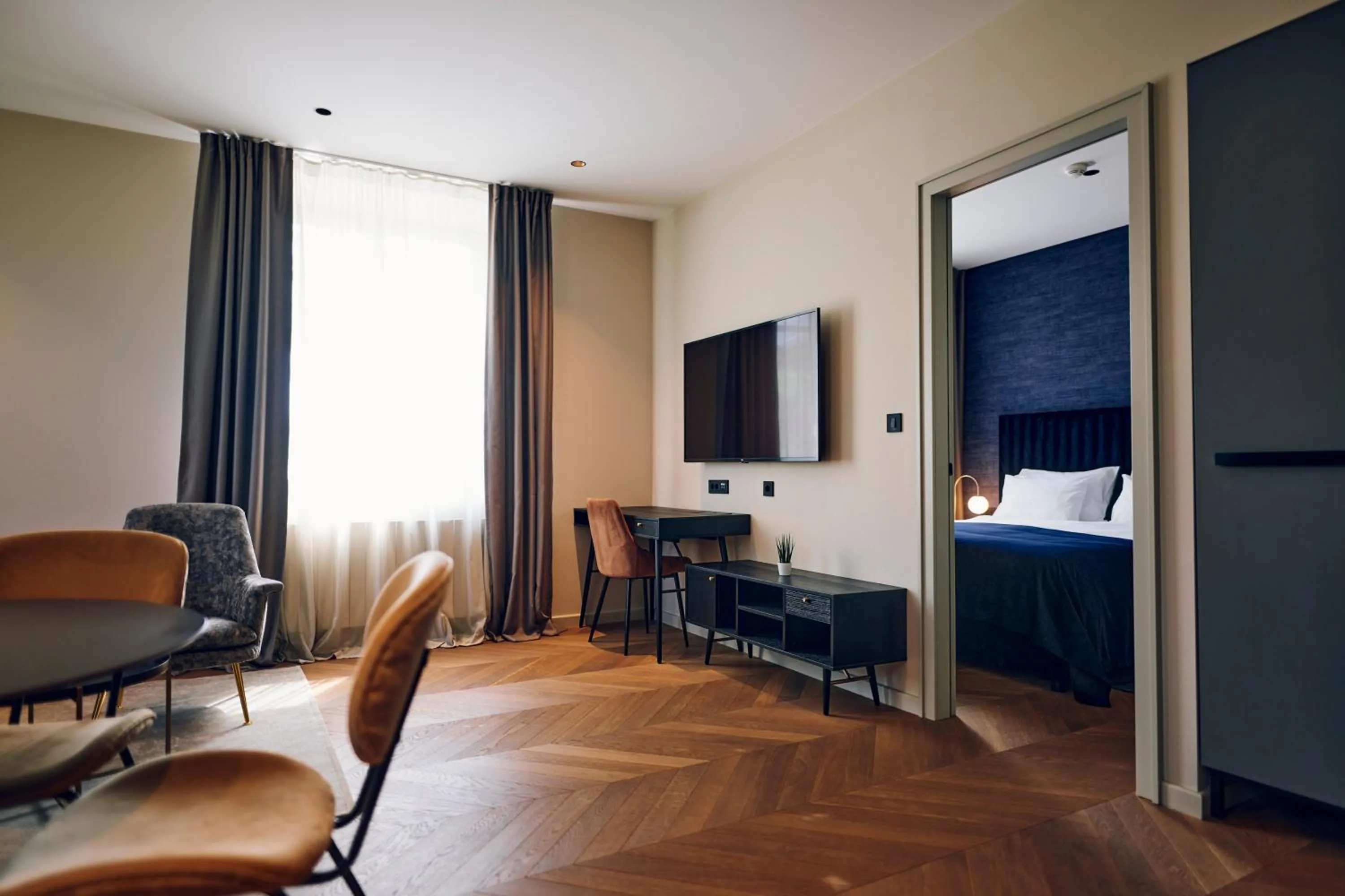 Communal lounge/ TV room, Bed in Hotel Republika