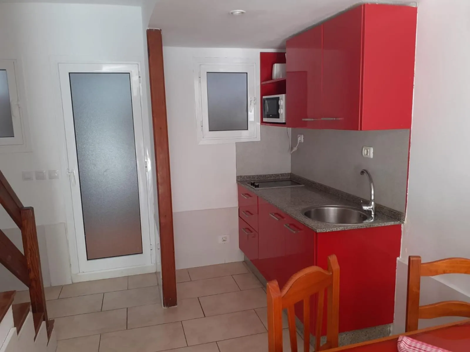 Kitchen or kitchenette in Niza Apartamentos