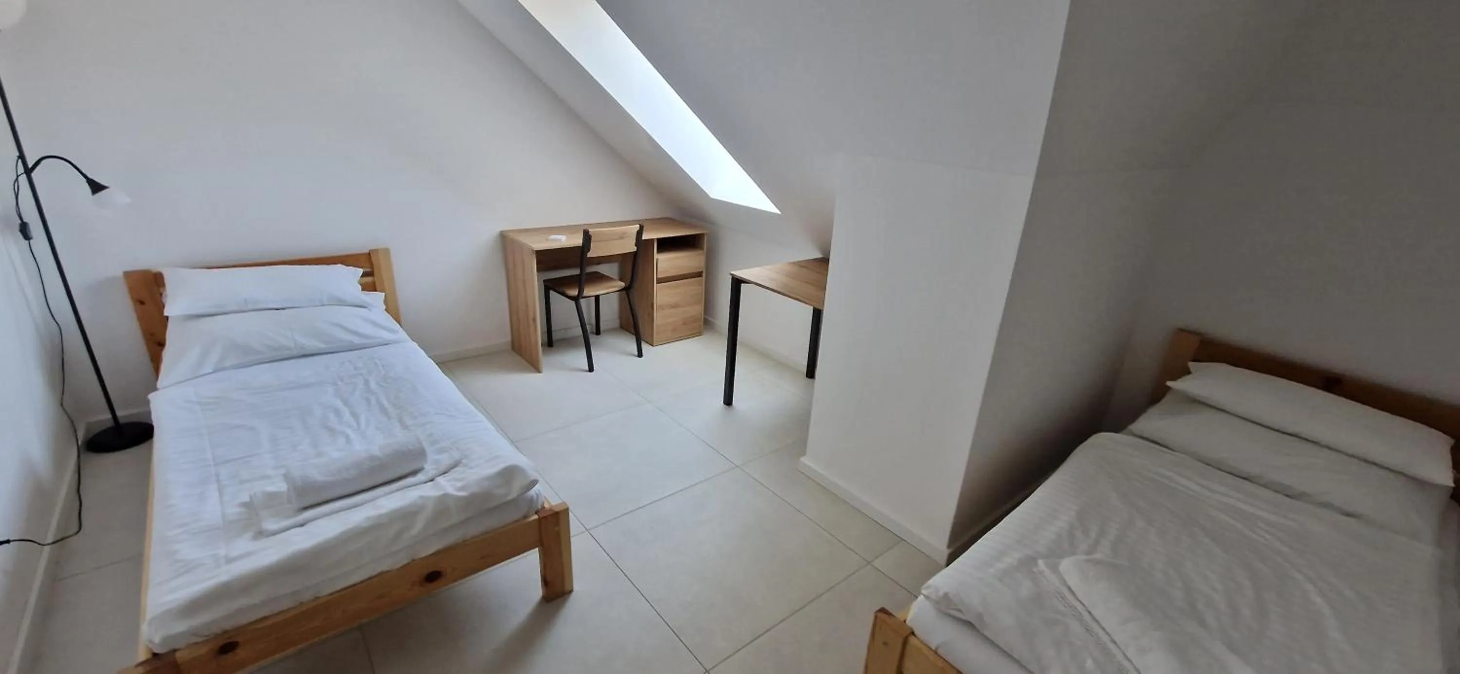 Photo of the whole room, Bed in Apartmánový dom GRAND - Contactless Check In