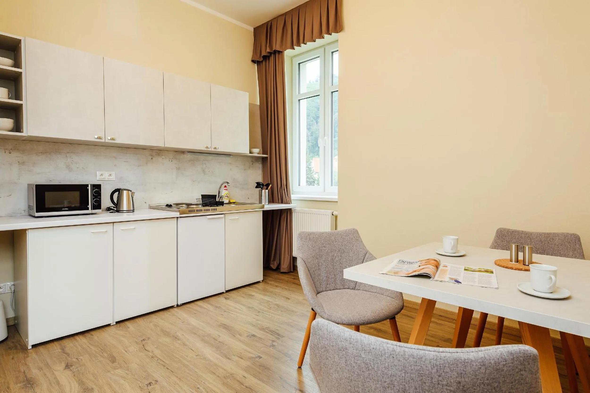 Kitchen or kitchenette in Apartmánový dom GRAND - Contactless Check In