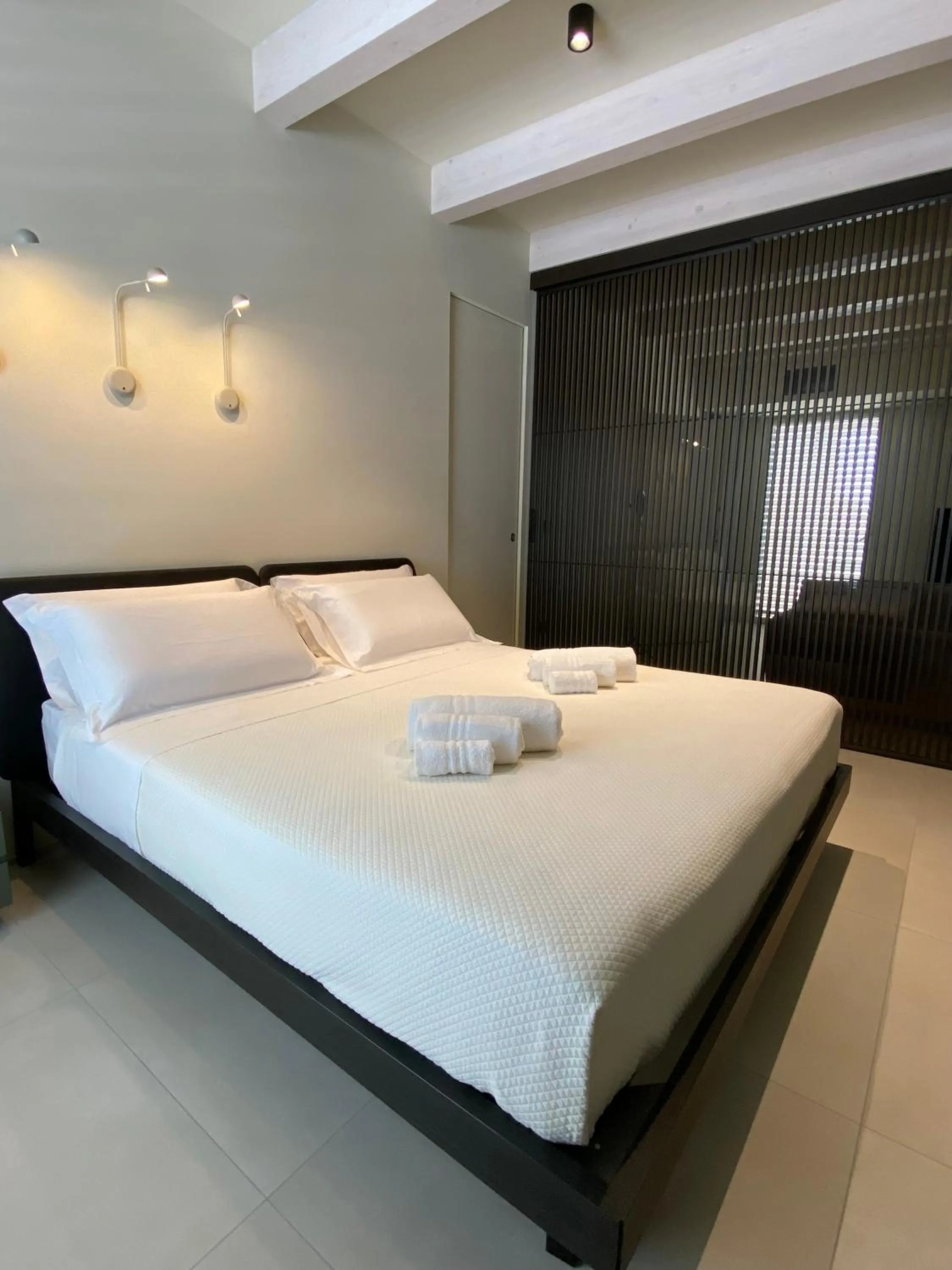 Bed in SETTANNI Sea Suites