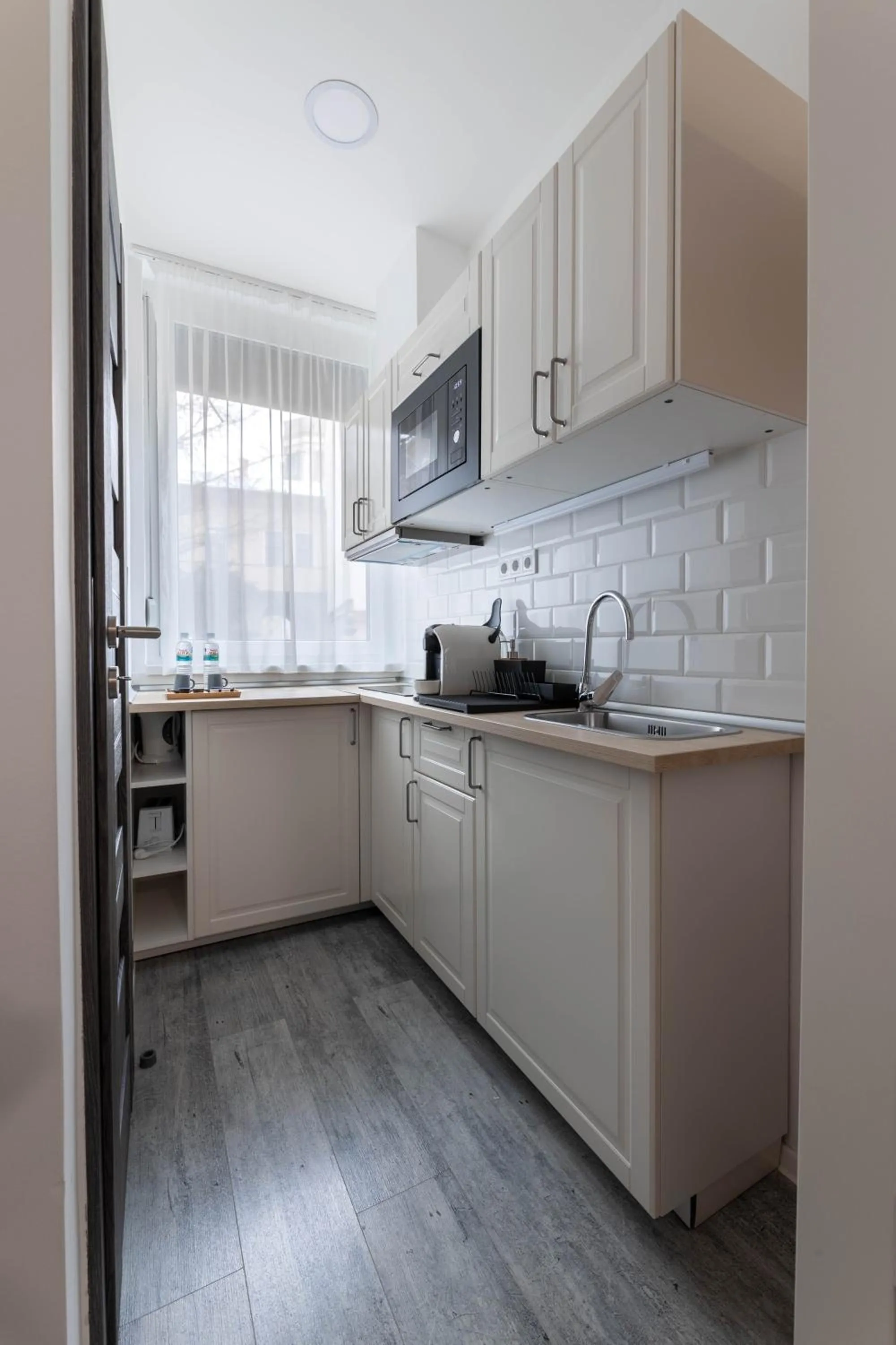Kitchen or kitchenette in Roomstore Studio Apartments