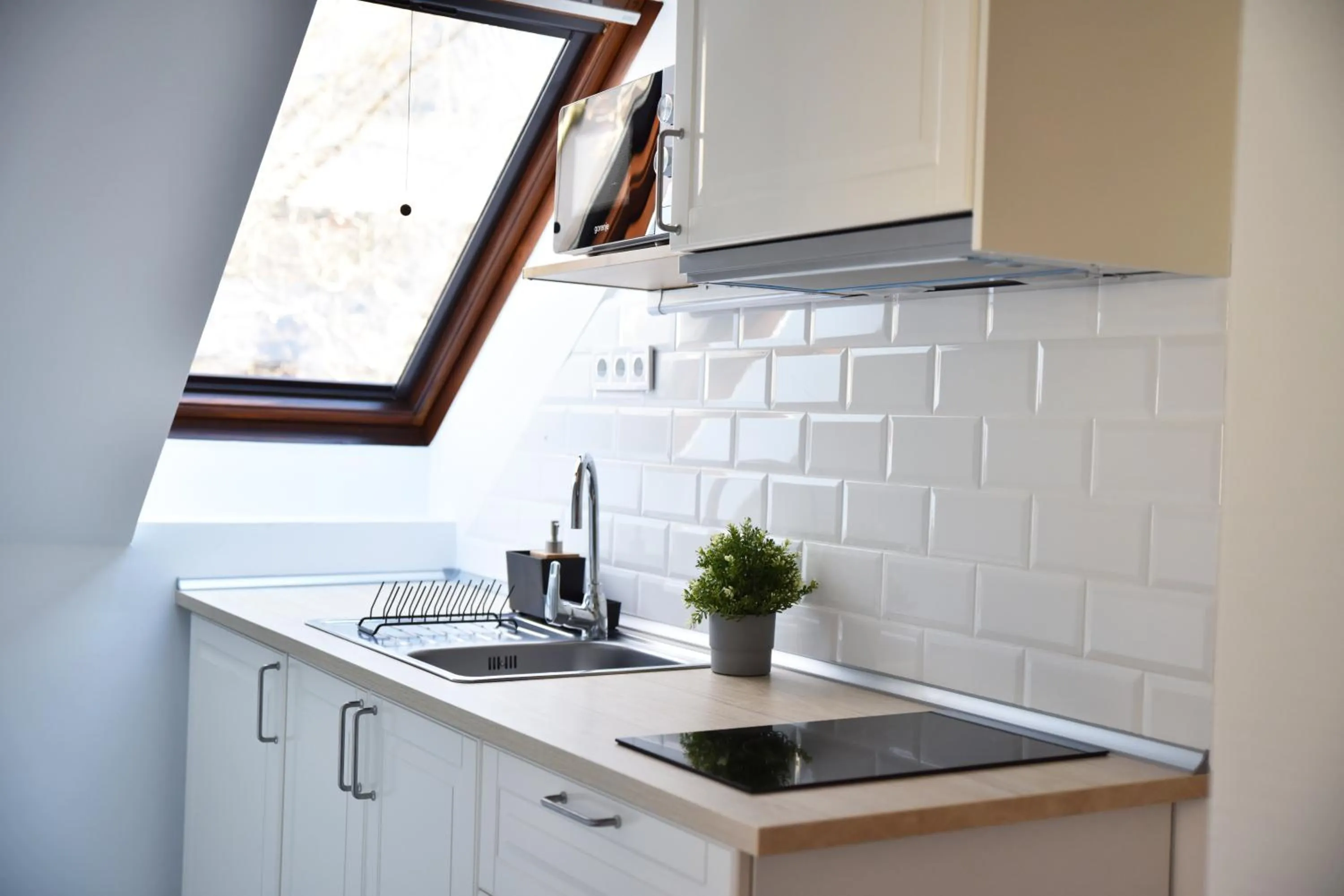 Kitchen or kitchenette in Roomstore Studio Apartments