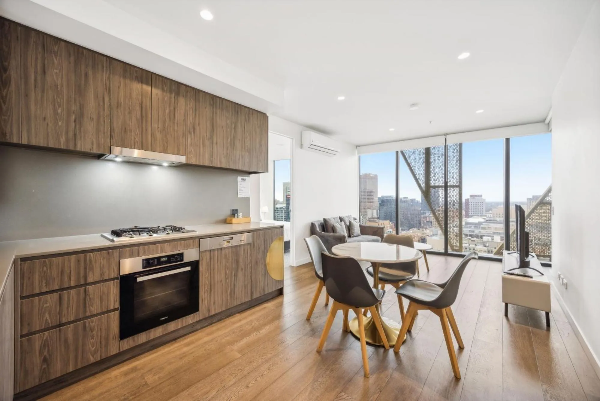 Kitchen or kitchenette in Realm Apartments by CLLIX