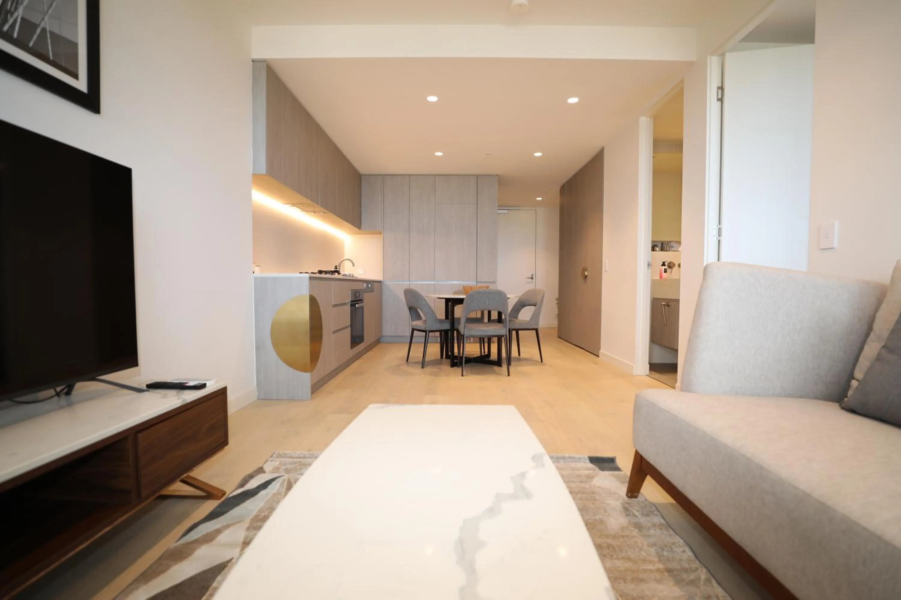 TV and multimedia in Realm Apartments by CLLIX