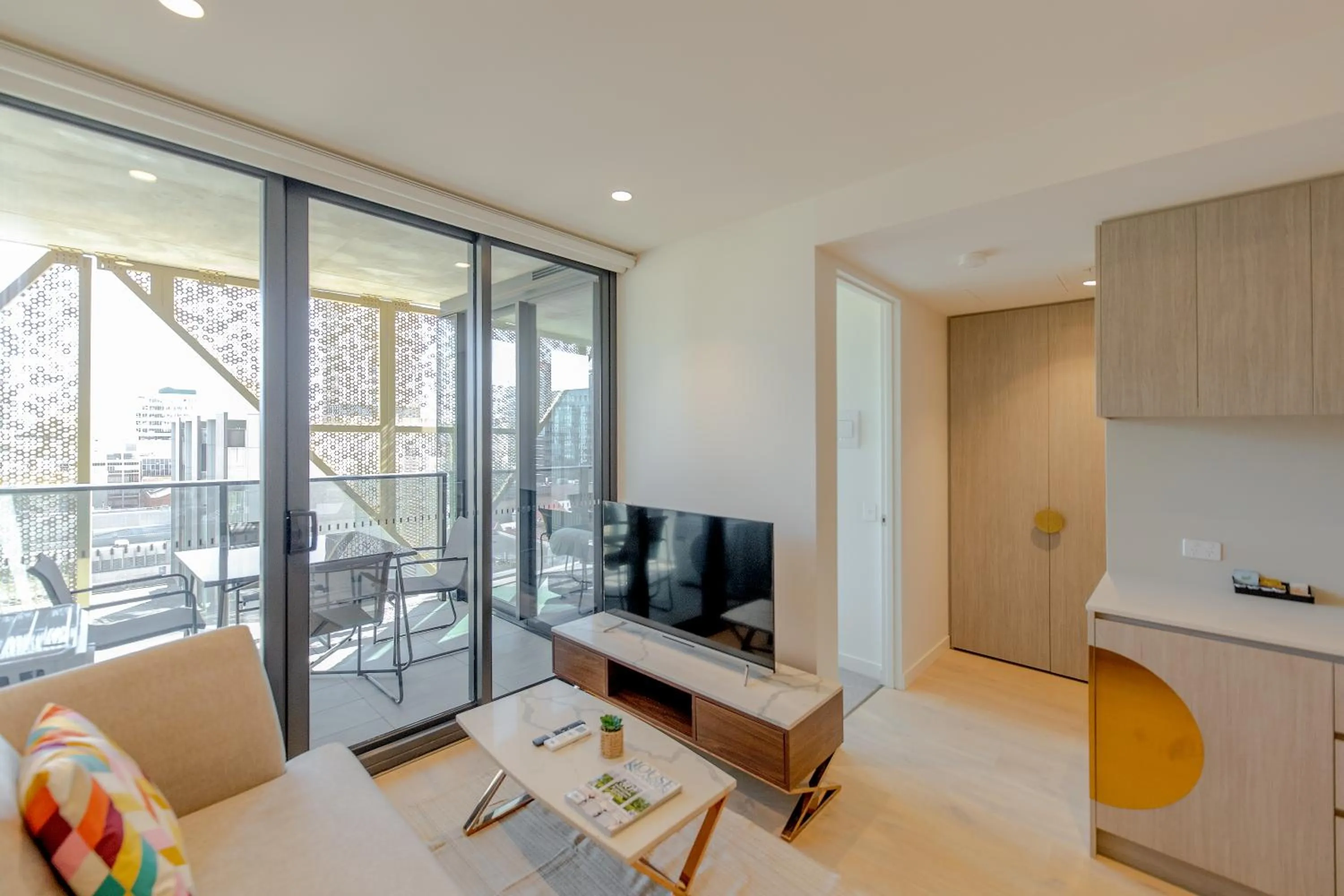 TV and multimedia in Realm Apartments by CLLIX