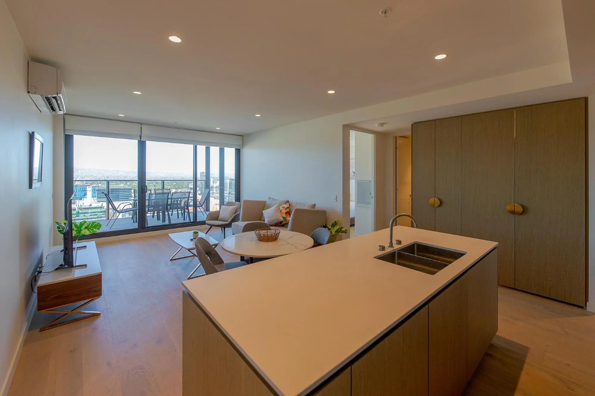 Kitchen or kitchenette in Realm Apartments by CLLIX