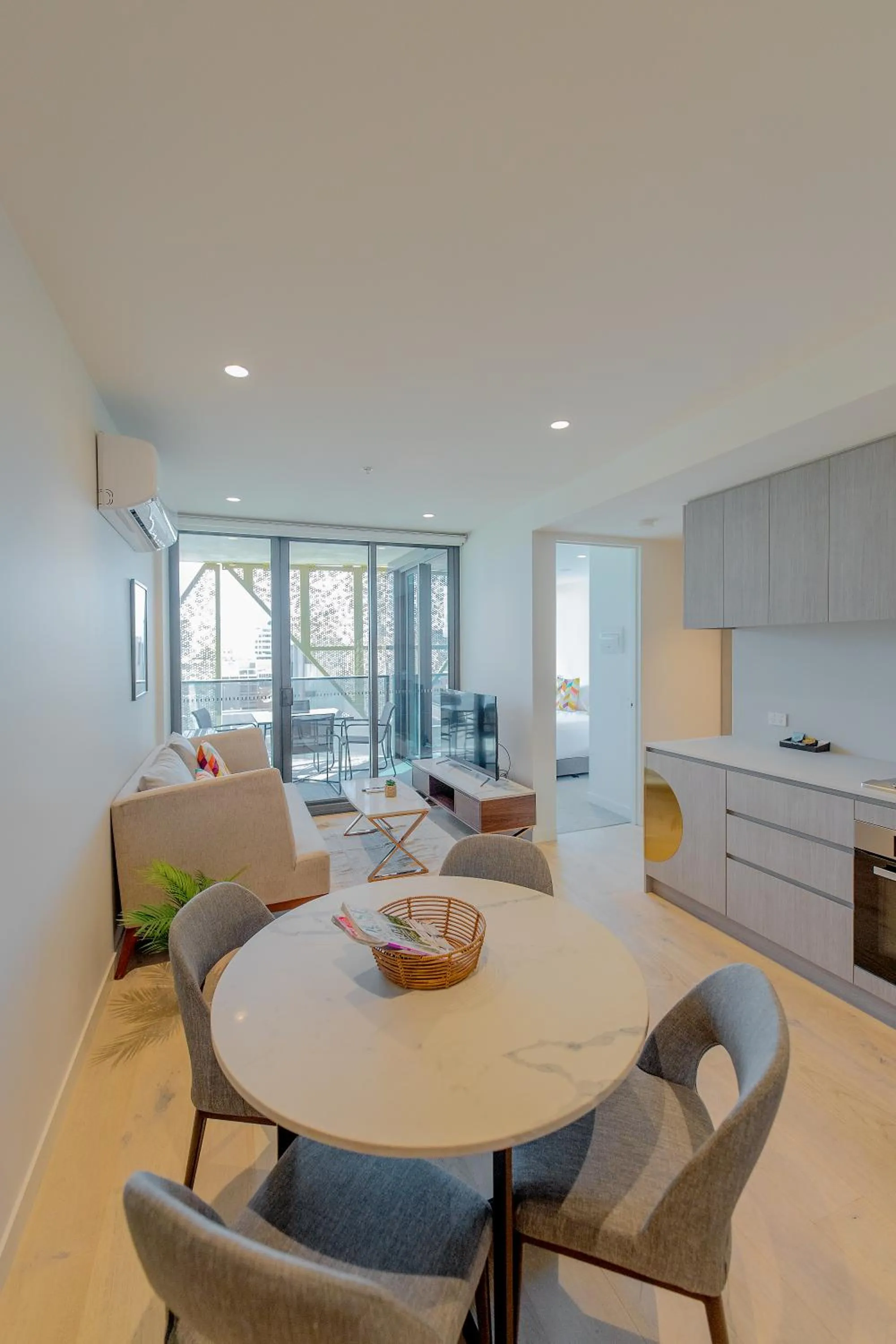 Dining area in Realm Apartments by CLLIX