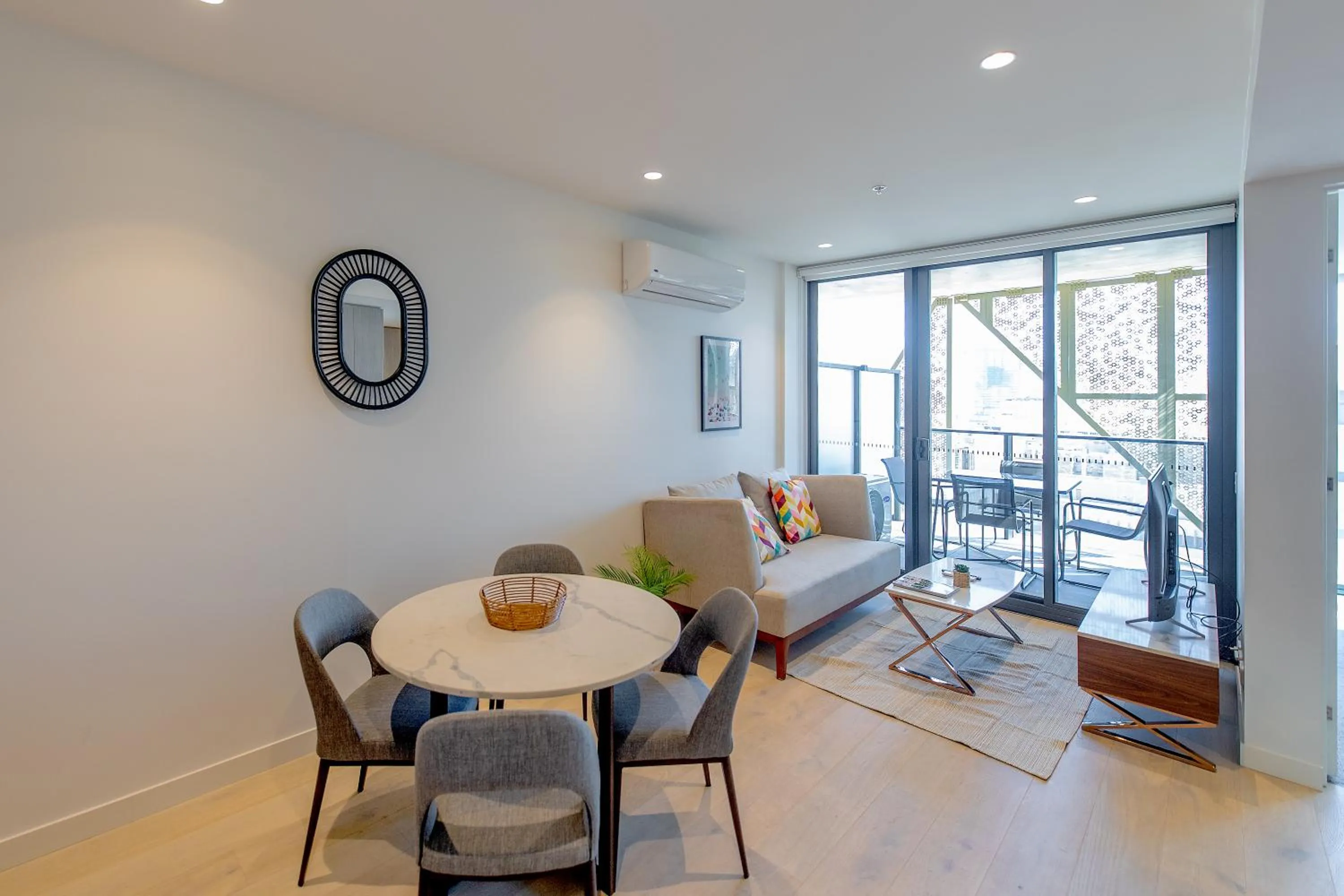 Dining area in Realm Apartments by CLLIX