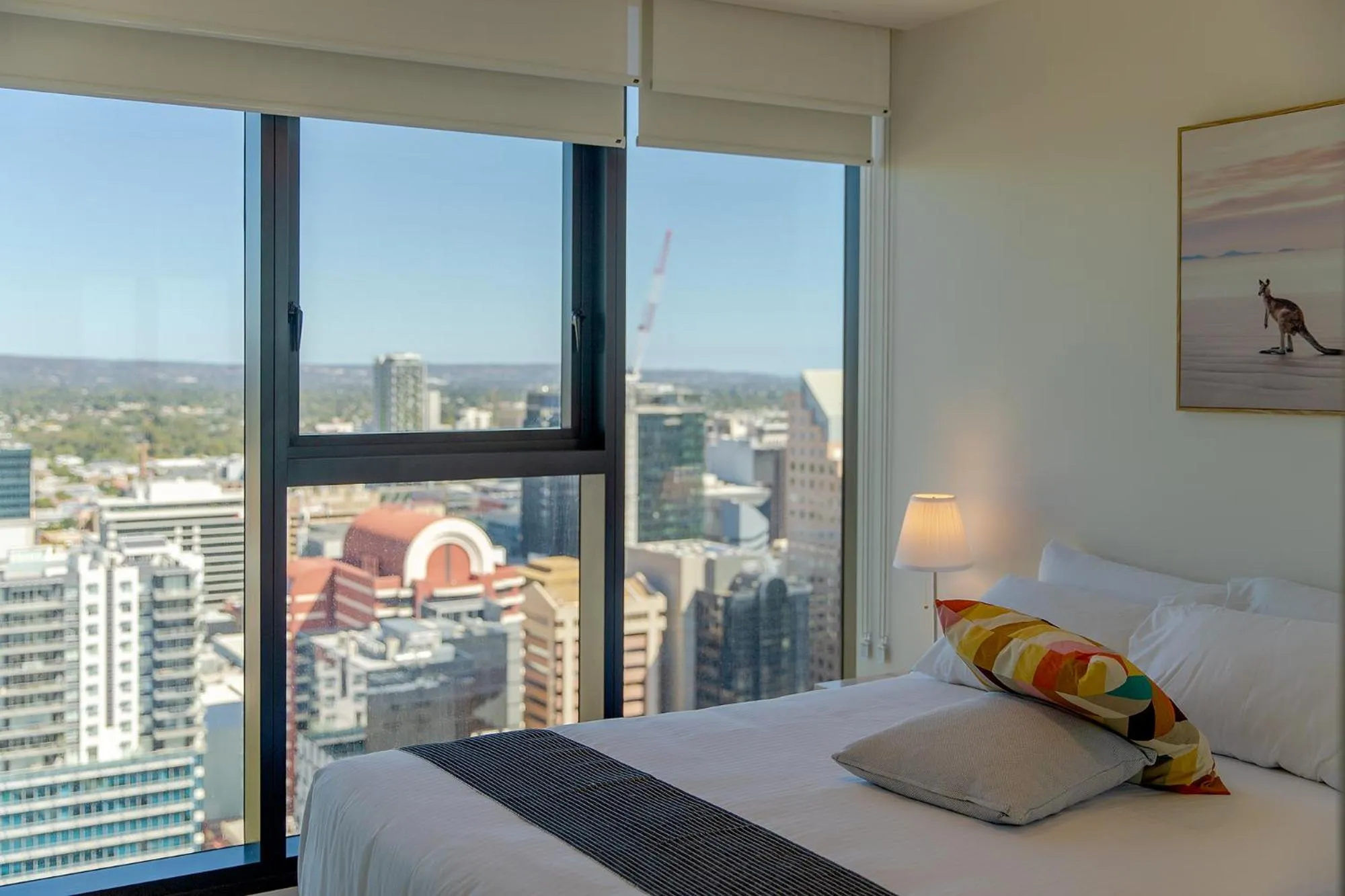 Bed in Realm Apartments by CLLIX