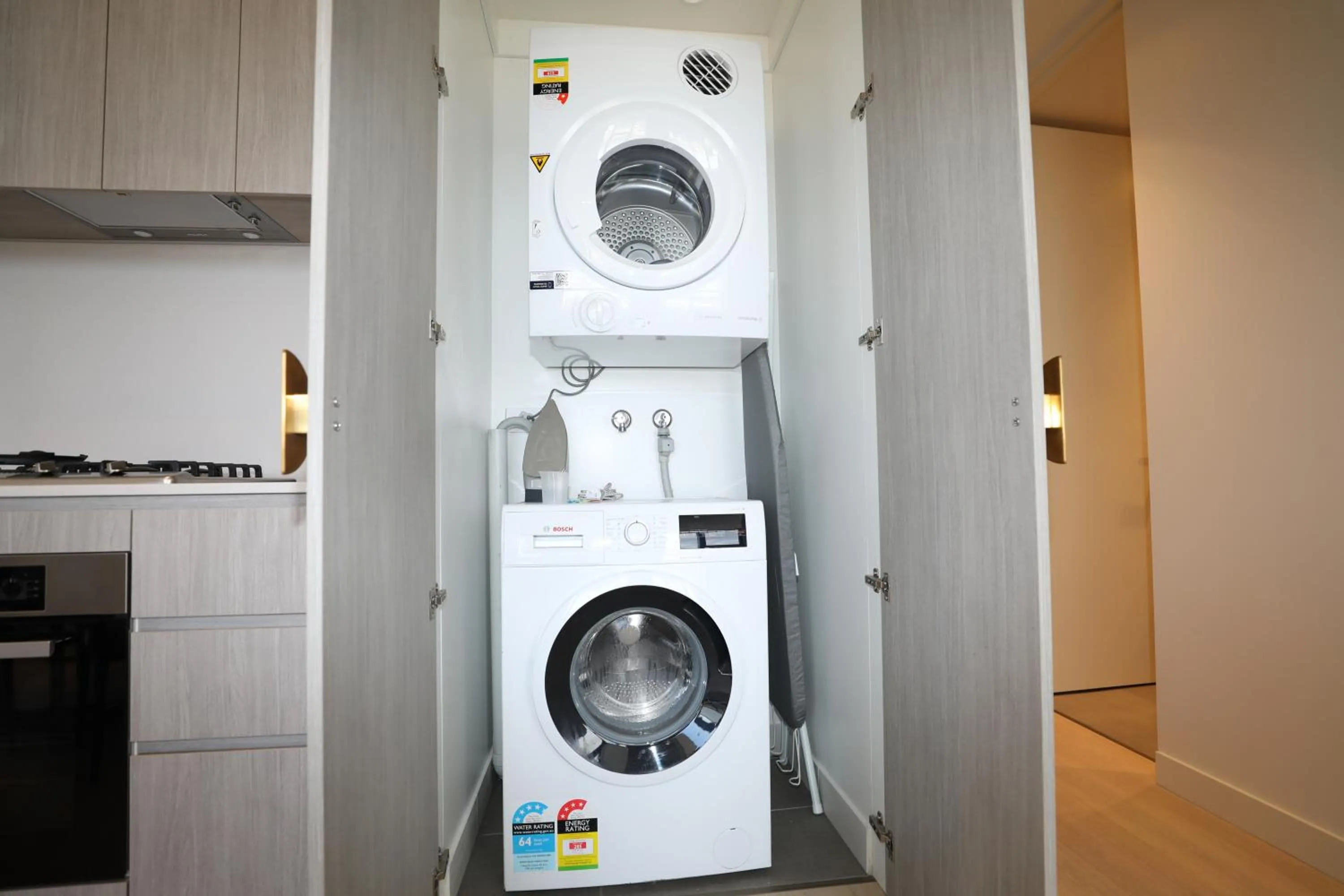 laundry in Realm Apartments by CLLIX