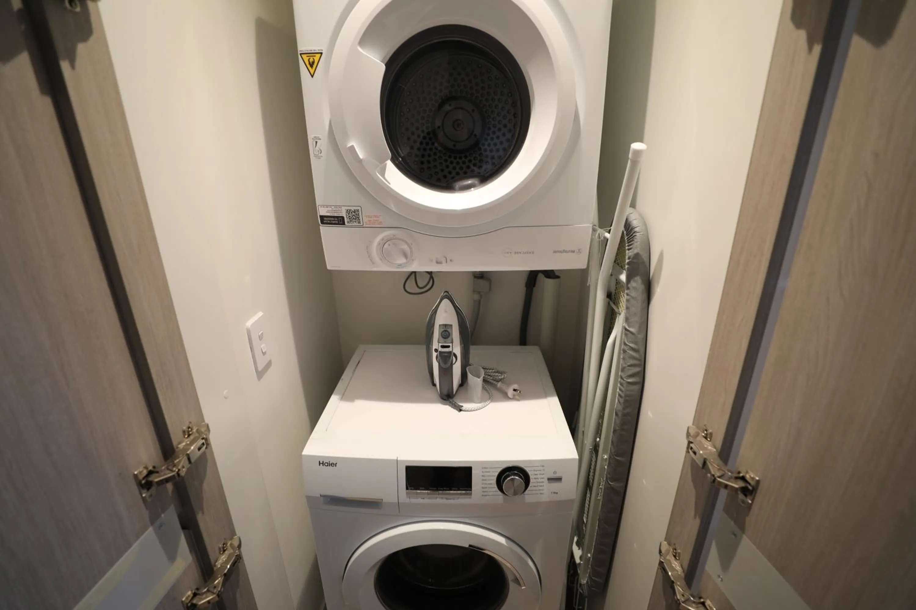 laundry in Realm Apartments by CLLIX