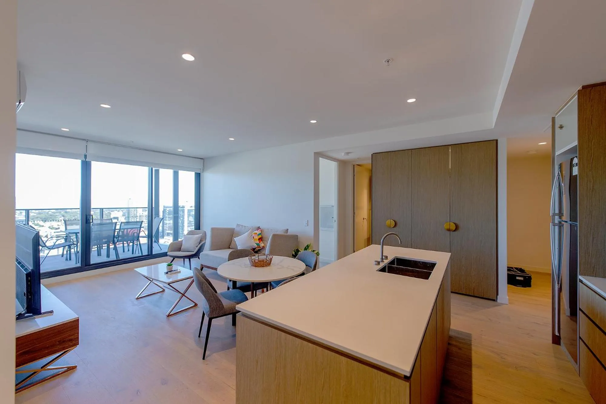 Kitchen or kitchenette in Realm Apartments by CLLIX