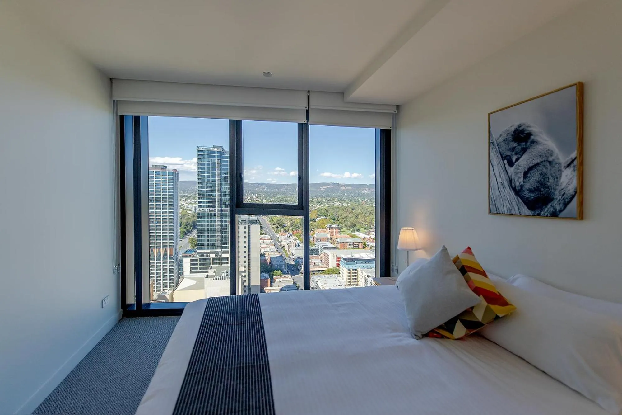 Bed in Realm Apartments by CLLIX