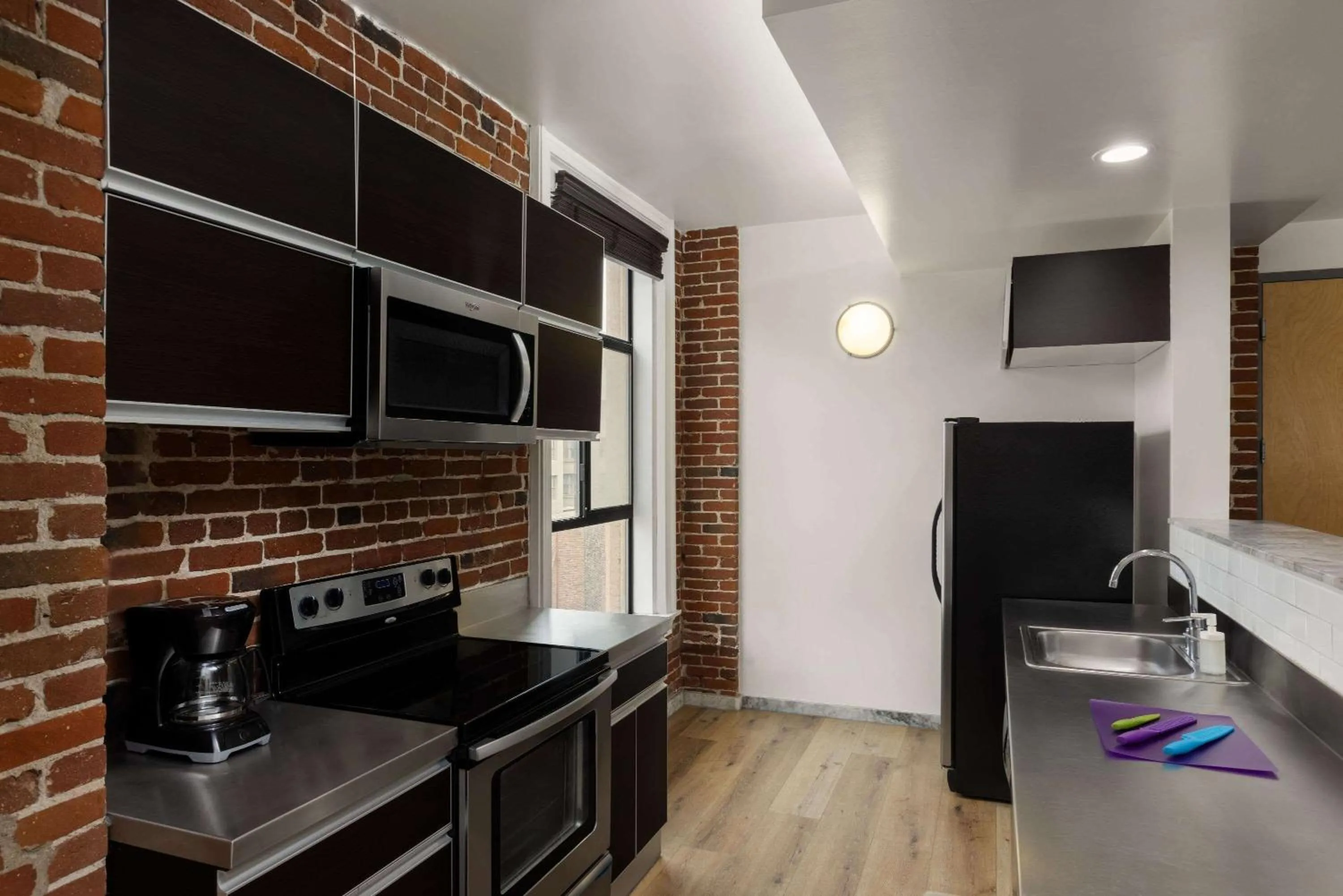 Kitchen or kitchenette in The Haas, Trademark Collection by Wyndham