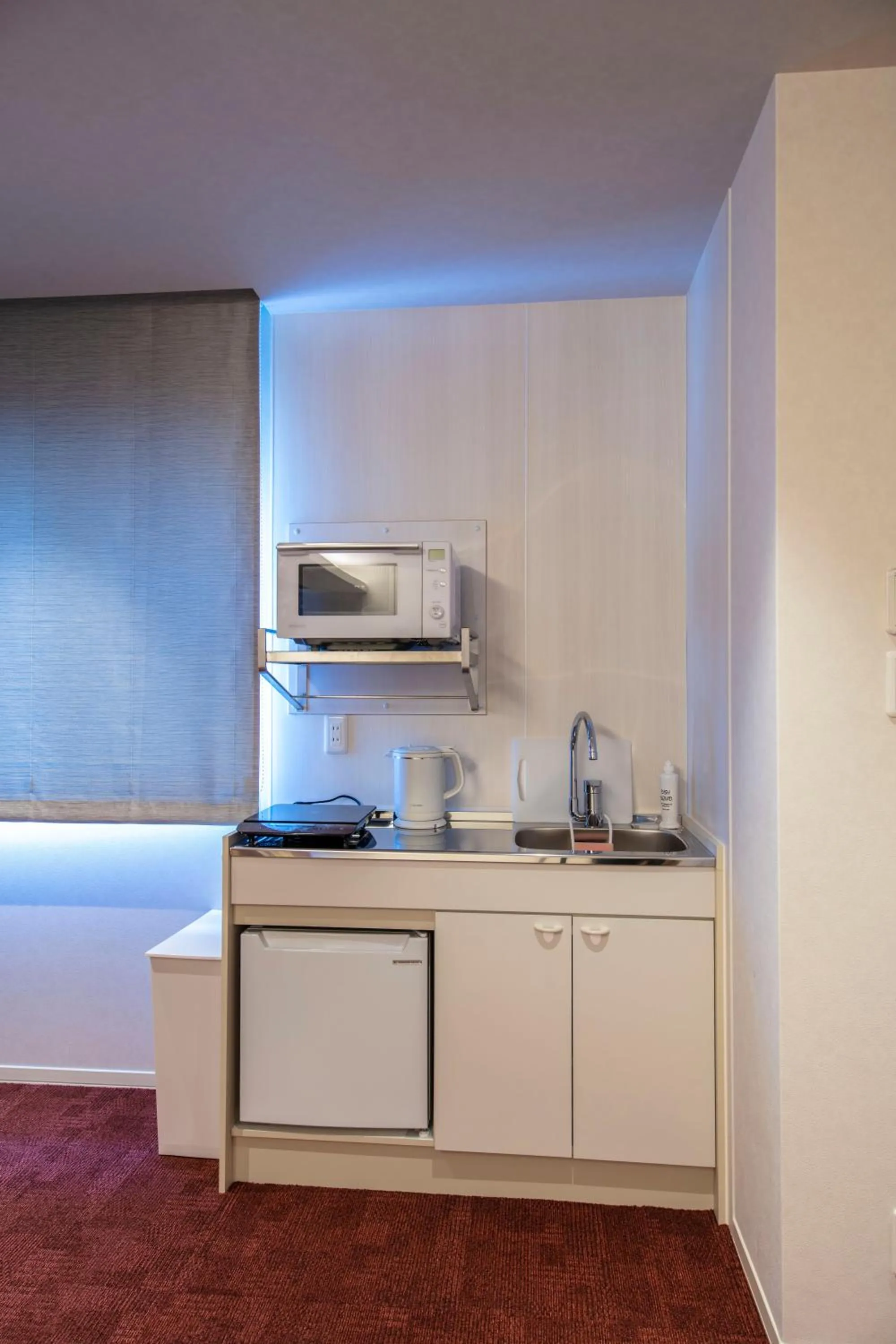 Kitchen or kitchenette in GRAND BASE Okayama Ekimae