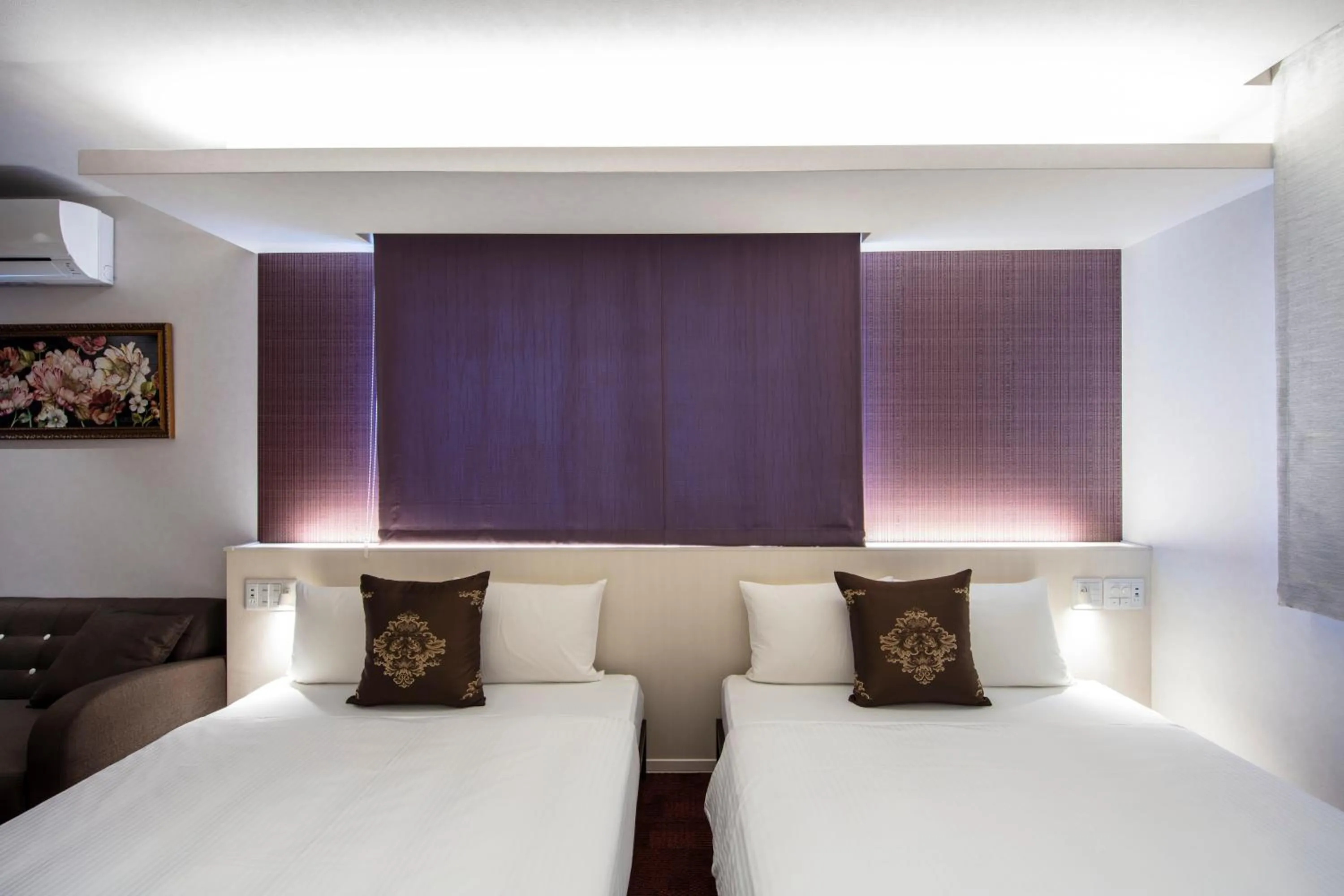 Bed in GRAND BASE Okayama Ekimae