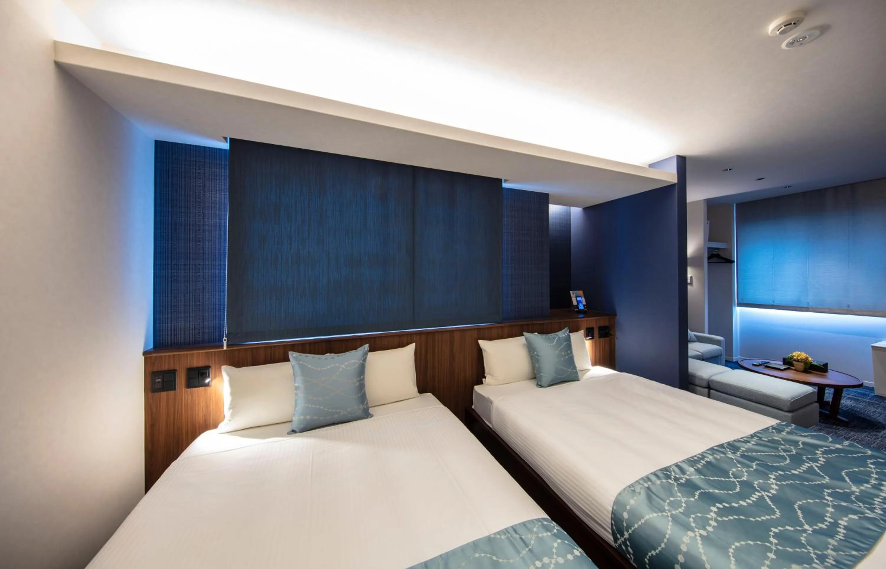 Bed in GRAND BASE Okayama Ekimae