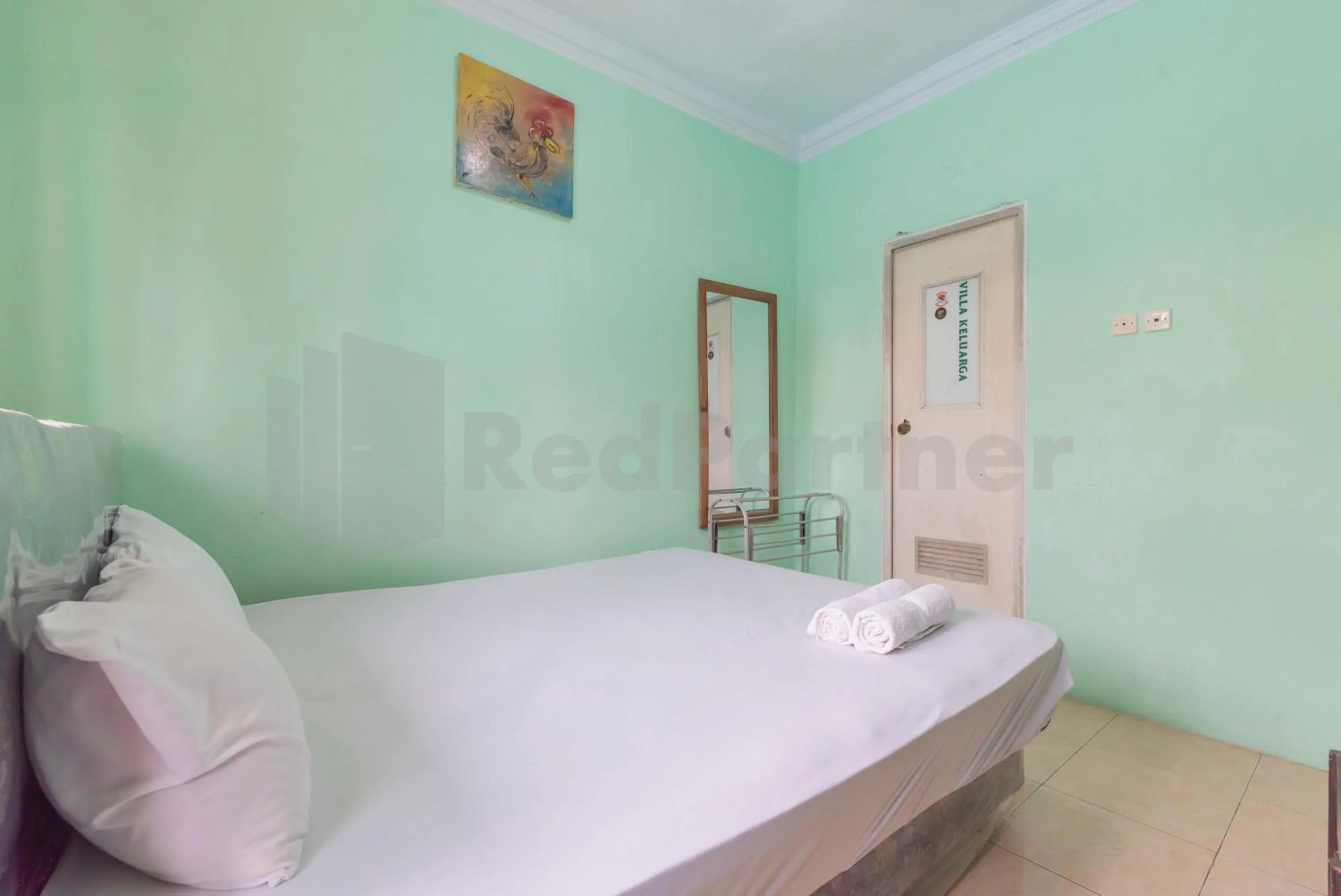 Bed in Villa Sari Intan Ciater RedPartner