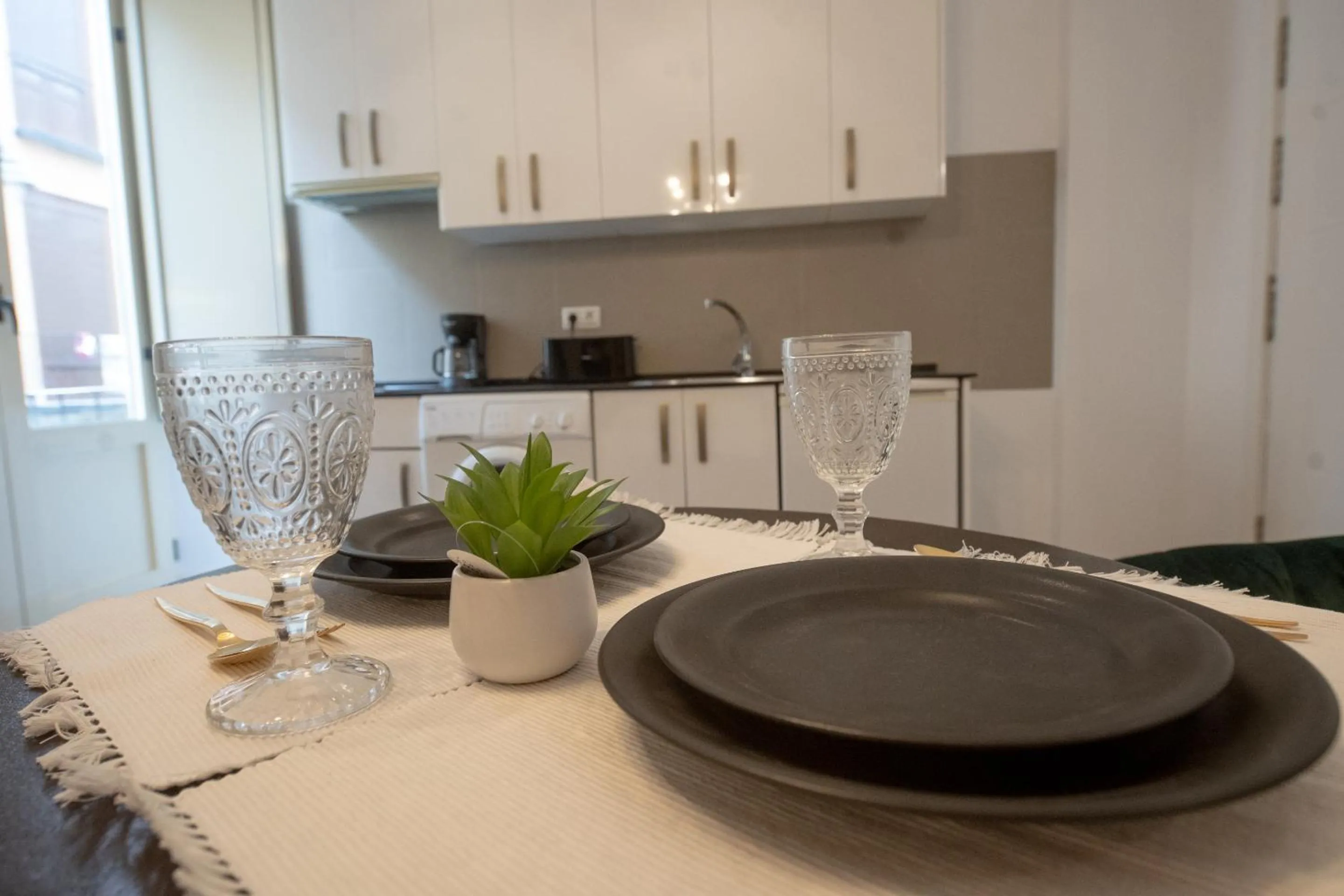 Kitchen or kitchenette in Suites La Merced
