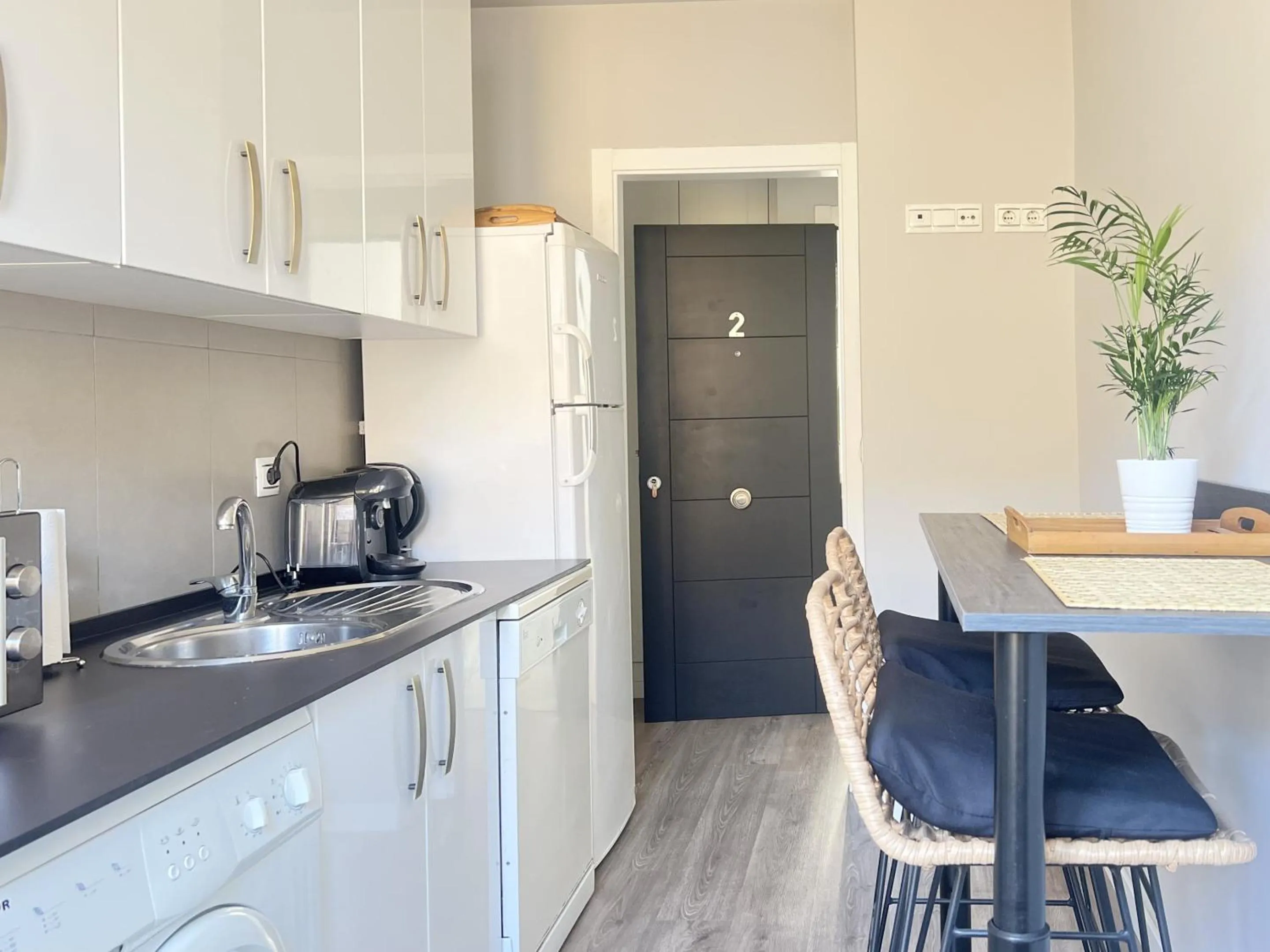 Kitchen or kitchenette in Suites La Merced