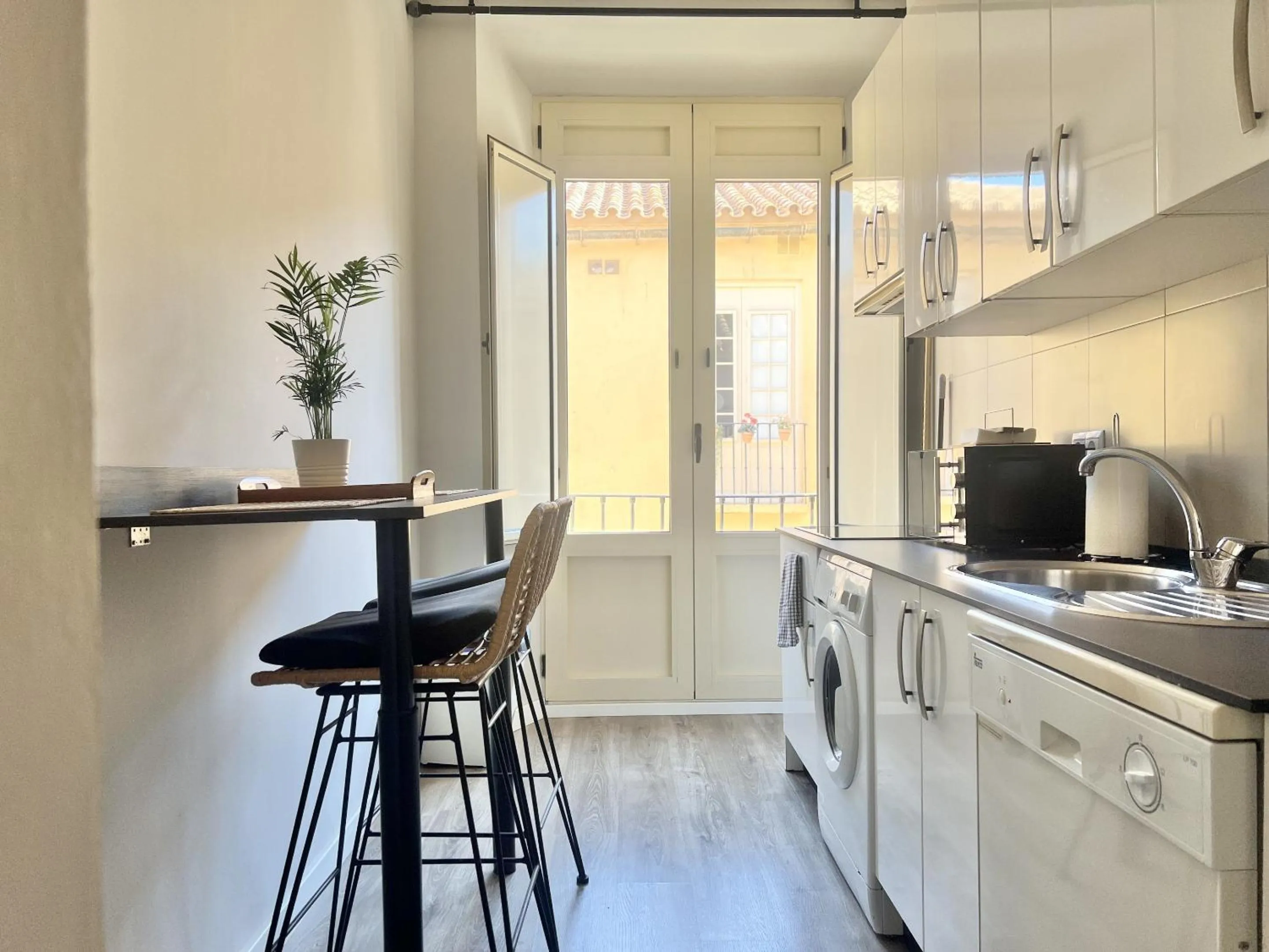 Kitchen or kitchenette in Suites La Merced