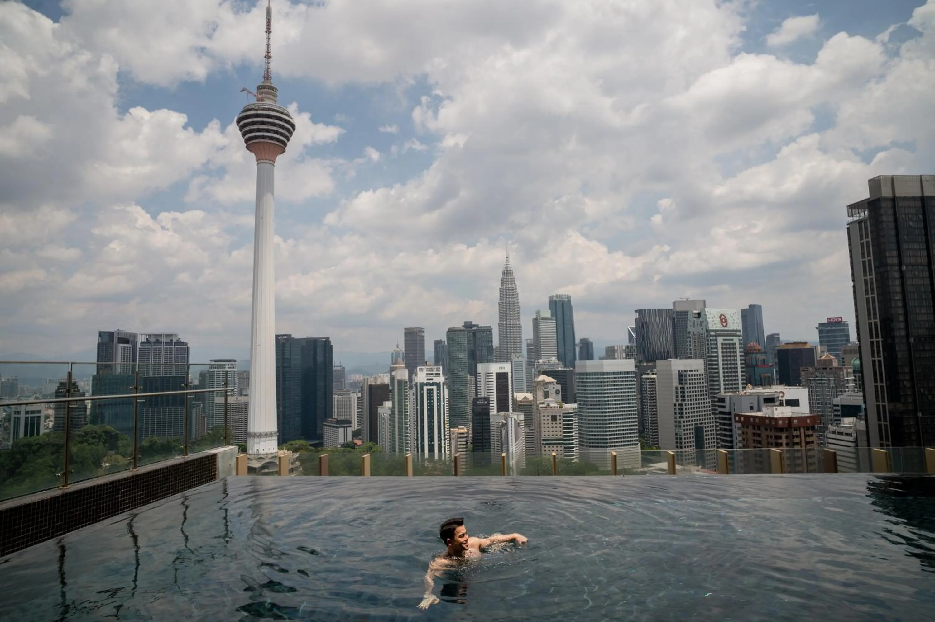Pool view in Ceylonz Suites KLCC Rooftop Infinity Pool KL Tower View