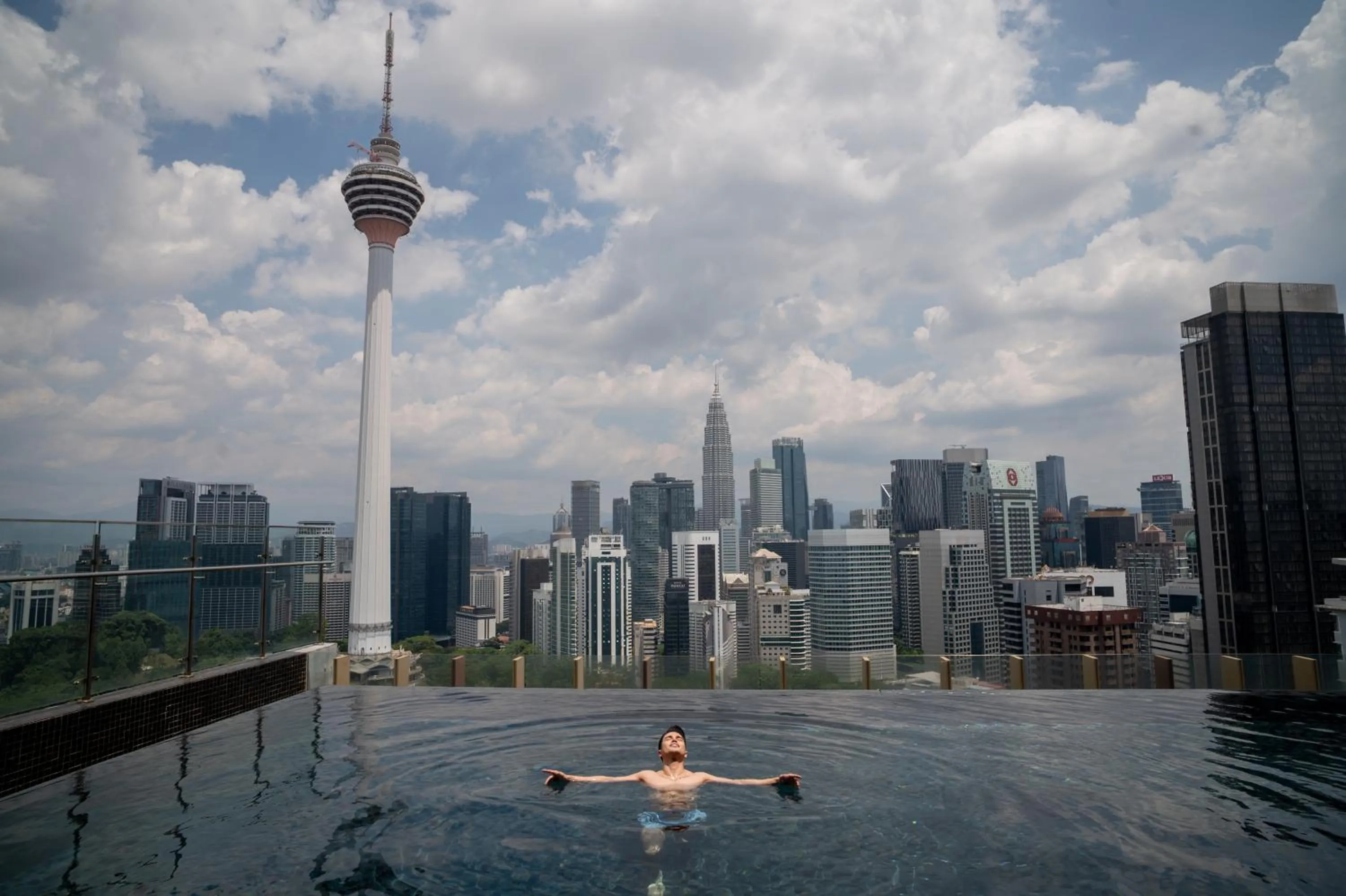 Pool view in Ceylonz Suites KLCC Rooftop Infinity Pool KL Tower View