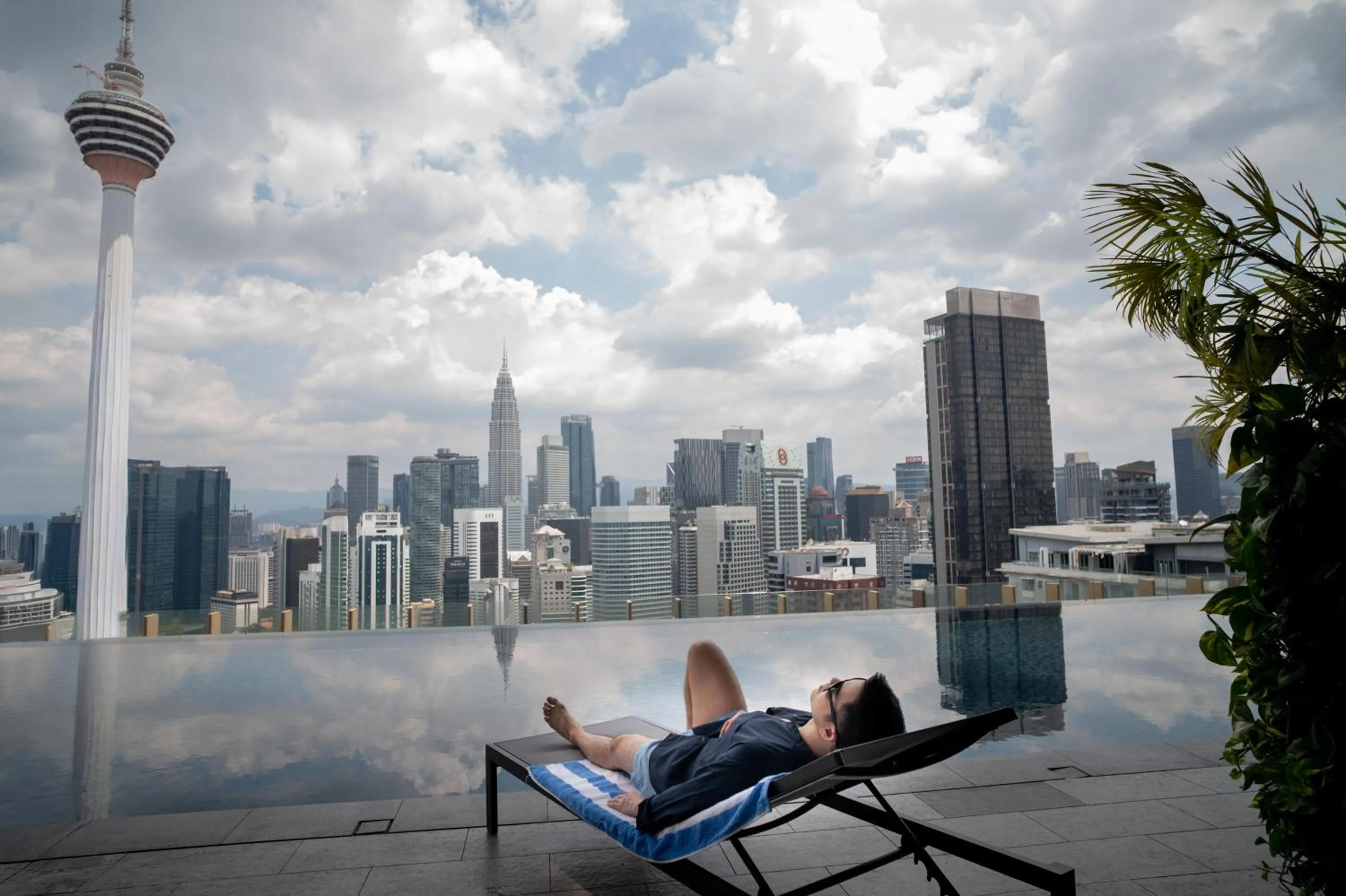 Pool view in Ceylonz Suites KLCC Rooftop Infinity Pool KL Tower View